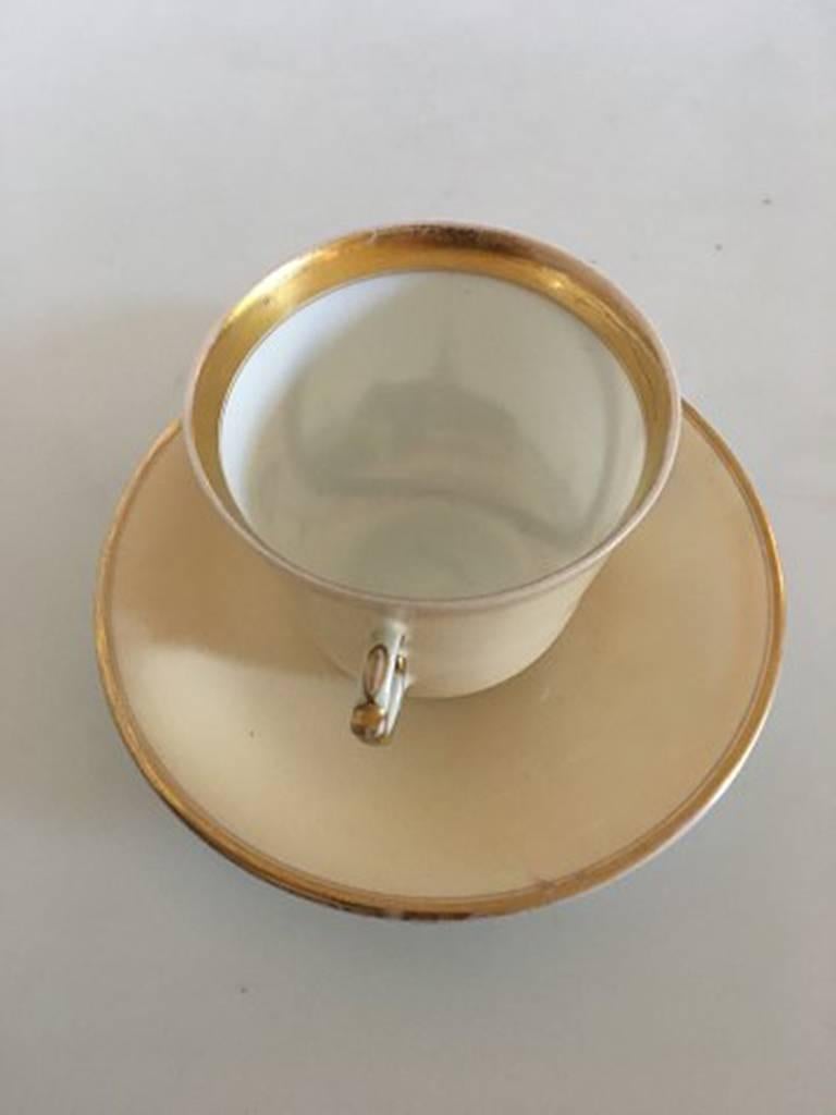 Neoclassical Bing & Grondahl Early Cup, Motif, the Exchange with Saucer and Royal Monogram For Sale