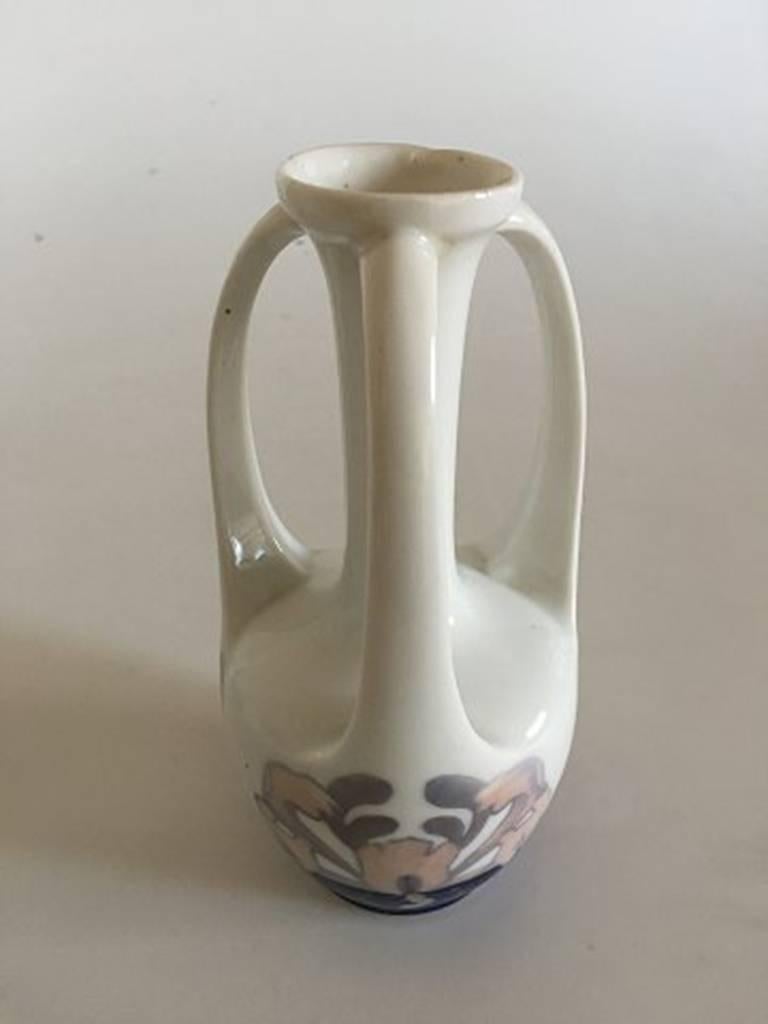 Royal Copenhagen Art Nouveau vase with three handles #290/60B. With Seaweed Motif. Measures: 18 cm H (7 3/32 in). 2nd quality, Has a small incorrectness at the top edge of the vase.