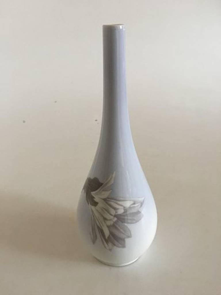 Royal Copenhagen Art Nouveau vase with flowers #31/61. Measures: 24 cm and is in good condition. Marked as first quality.