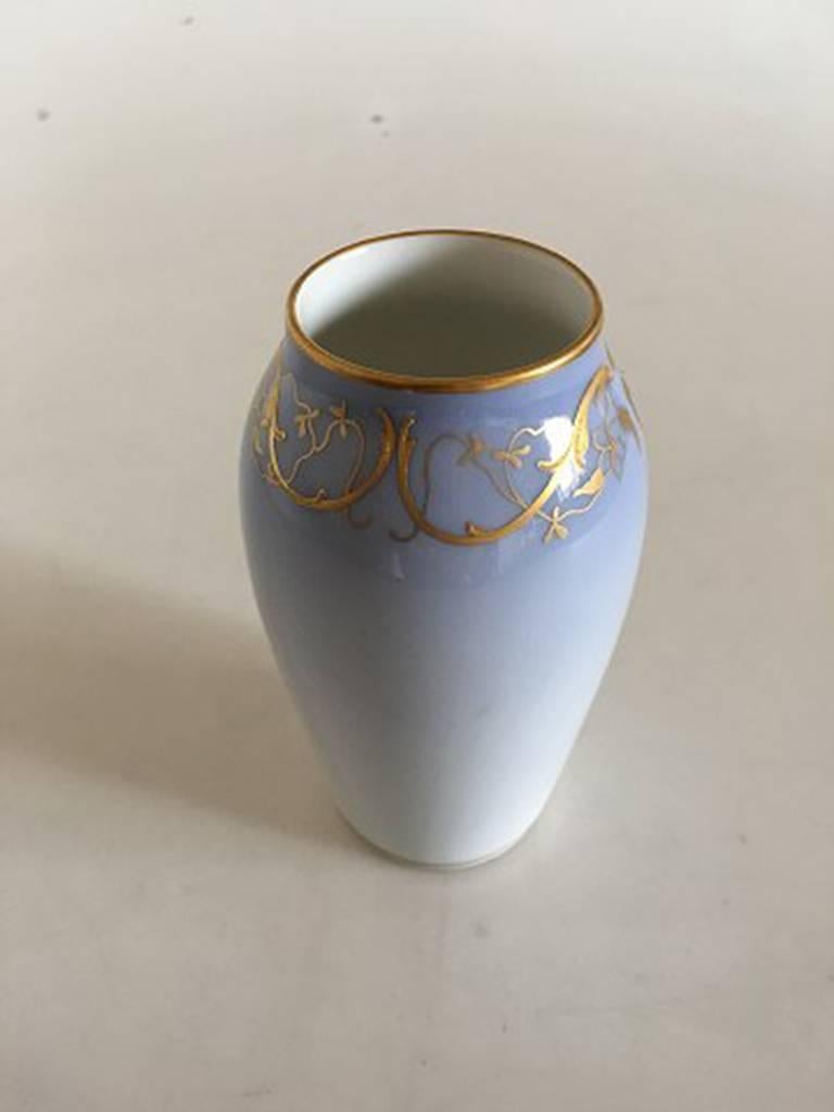 Royal Copenhagen Art Nouveau vase with gold #144/1212/88A. Measures: 12.5 cm and is in perfect condition.