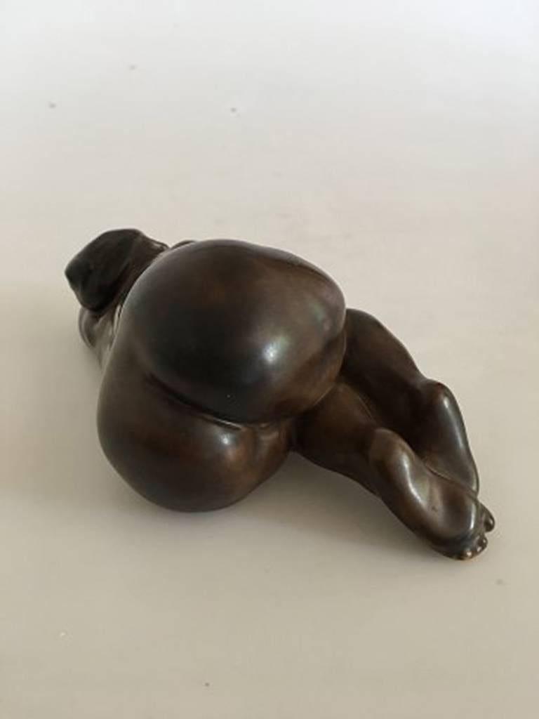 Kai Nielsen Bing & Grondahl Stoneware Figurine no. 20 of sleeping woman with grapes. Measures: 18.2 cm L (7 11/64 in.). 6.5 cm H (2 9/16 inch). In perfect condition.