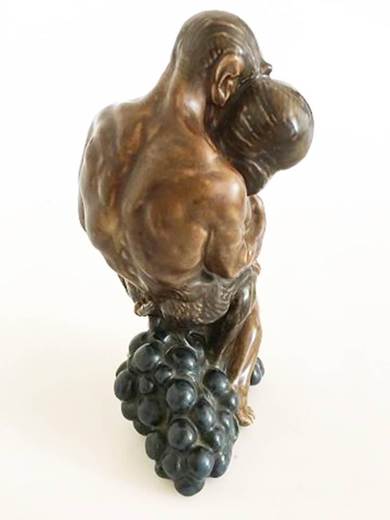 Scandinavian Modern Kai Nielsen Stoneware Figurine No. 23 of Pan with Woman and Grapes For Sale