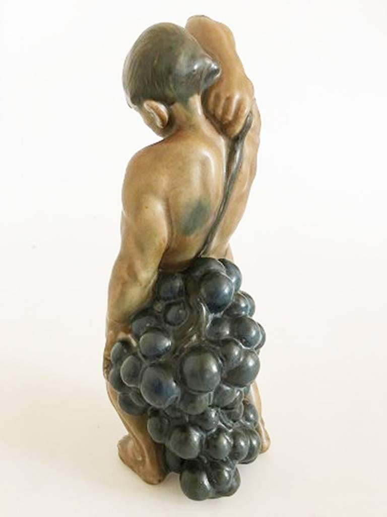 Scandinavian Modern Kai Nielsen Stoneware Figurine No. 25 Man with Grapes For Sale