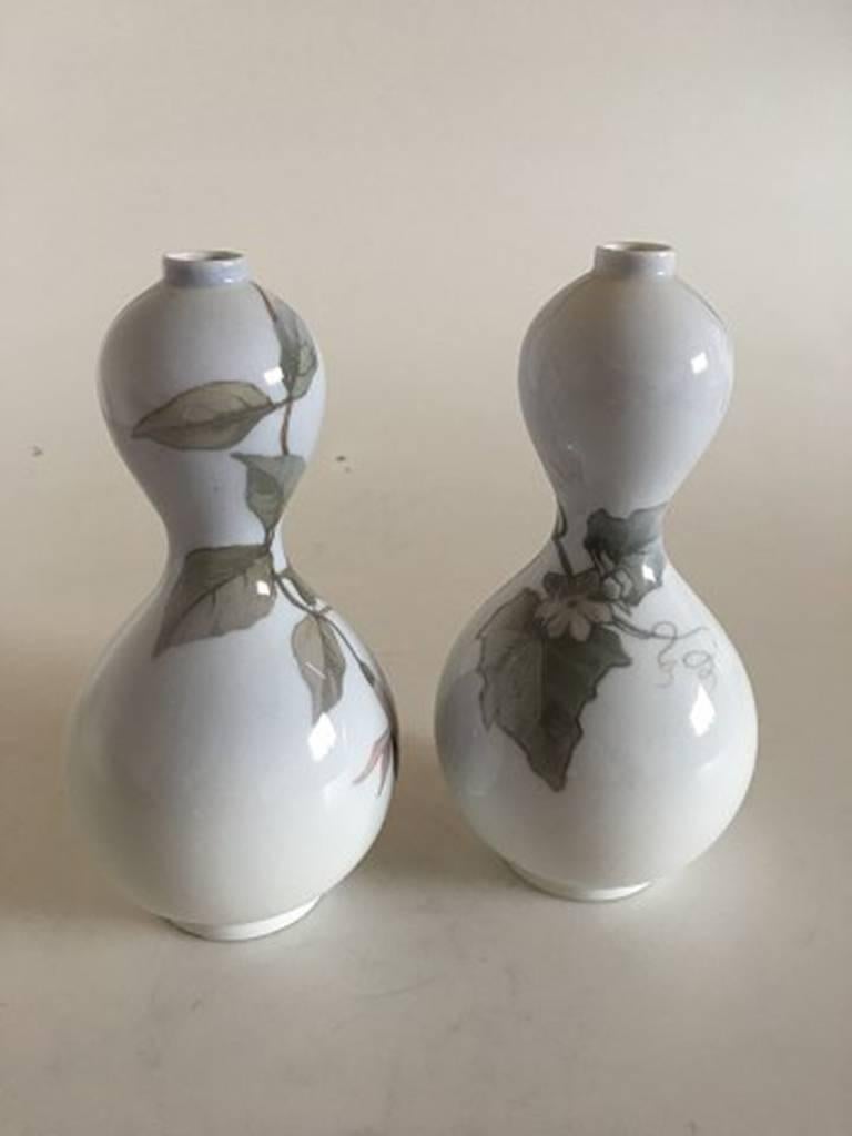 Royal Copenhagen Art Nouveau pair of gourd shaped vases #250/121. Measures: 17.5 cm and are in perfect condition.