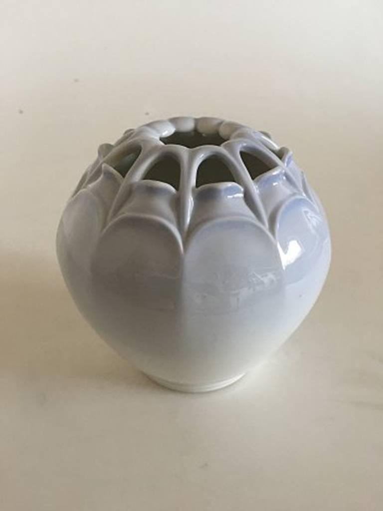 Royal Copenhagen Art Nouveau vase pierced #53/257. Measures 13 cm and is in good condition. Is marked as a second, as it has a firing crack on the bottom.