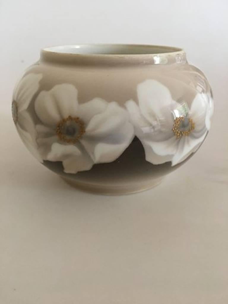 Bing & Grondahl Art Nouveau unique vase from the Christmas of 1908. Measures 9.5cm x 15.5cm and is in perfect condition. The flowers knobs have gold decoration in over glaze.