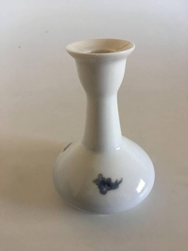 Royal Copenhagen candlestick #2247/430 with flower motif. Measures: 14 cm H (5 33/64) inches. 3rd quality. In nice and whole condition.