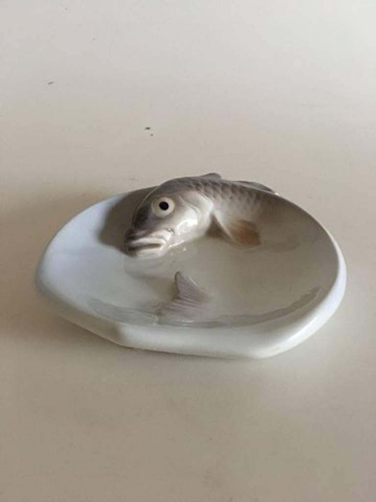 Royal Copenhagen bowl with fish #619. 1st Quality. The bowl has small chip on the fin of the fish. 14.5 cm (5 45/64 in).