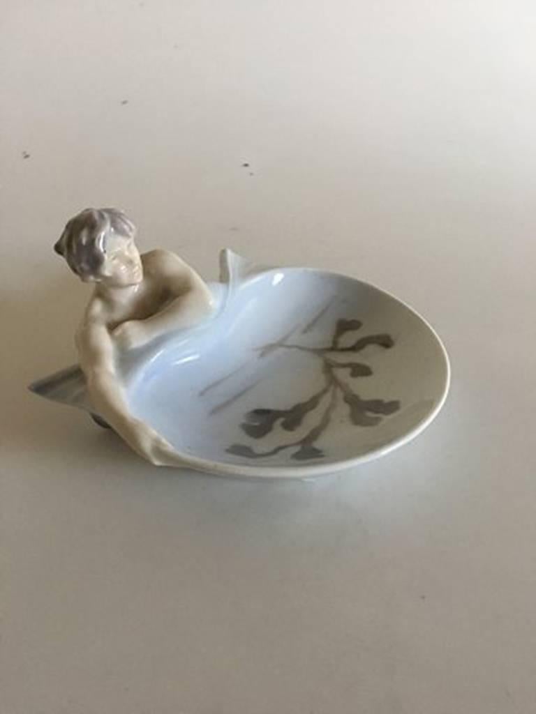 Royal Copenhagen Art Nouveau merman dish #389/744. Measures 15.5 cm / 6 1/10 in. and is in good condition.