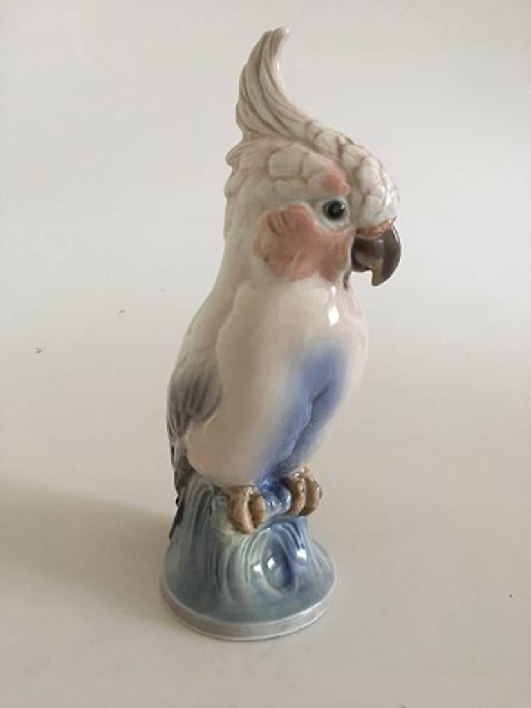 Dahl Jensen cockatoo figurine #1051. Measures 24cm high and is in good condition. Marked as a second.