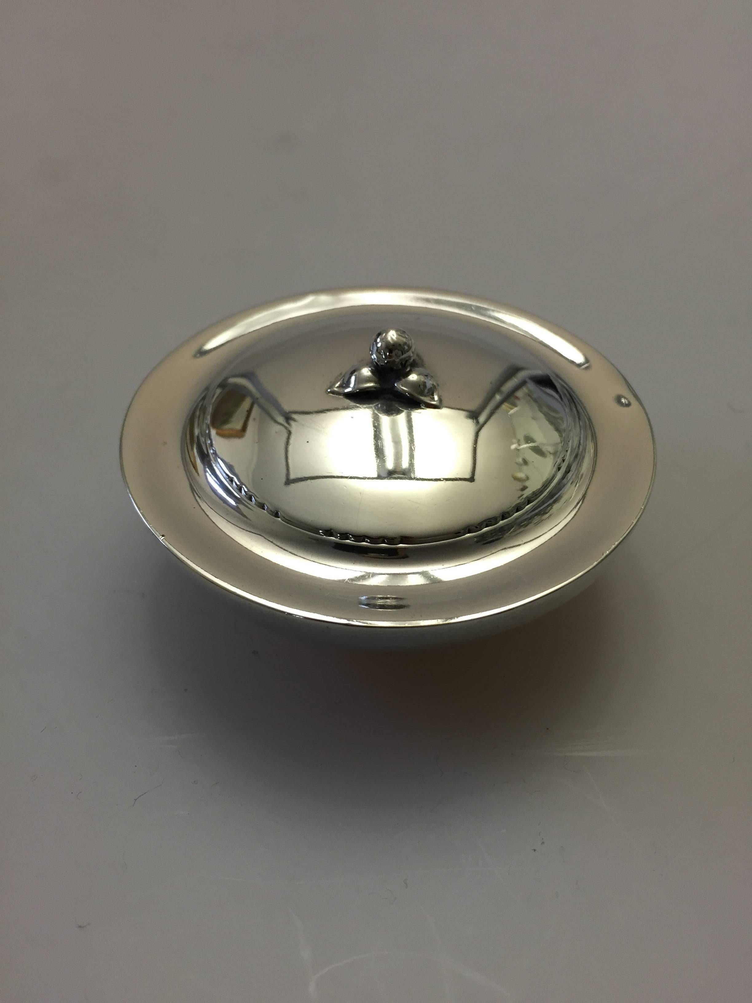 Georg Jensen sterling silver Bonbonniere with early marks. Designed by Johan Rohde.

Johan Rohde designed products for Georg Jensen silver Smithy, beginning in 1906. Rohde's designs have much in common with Georg Jensen's own as in they bear the