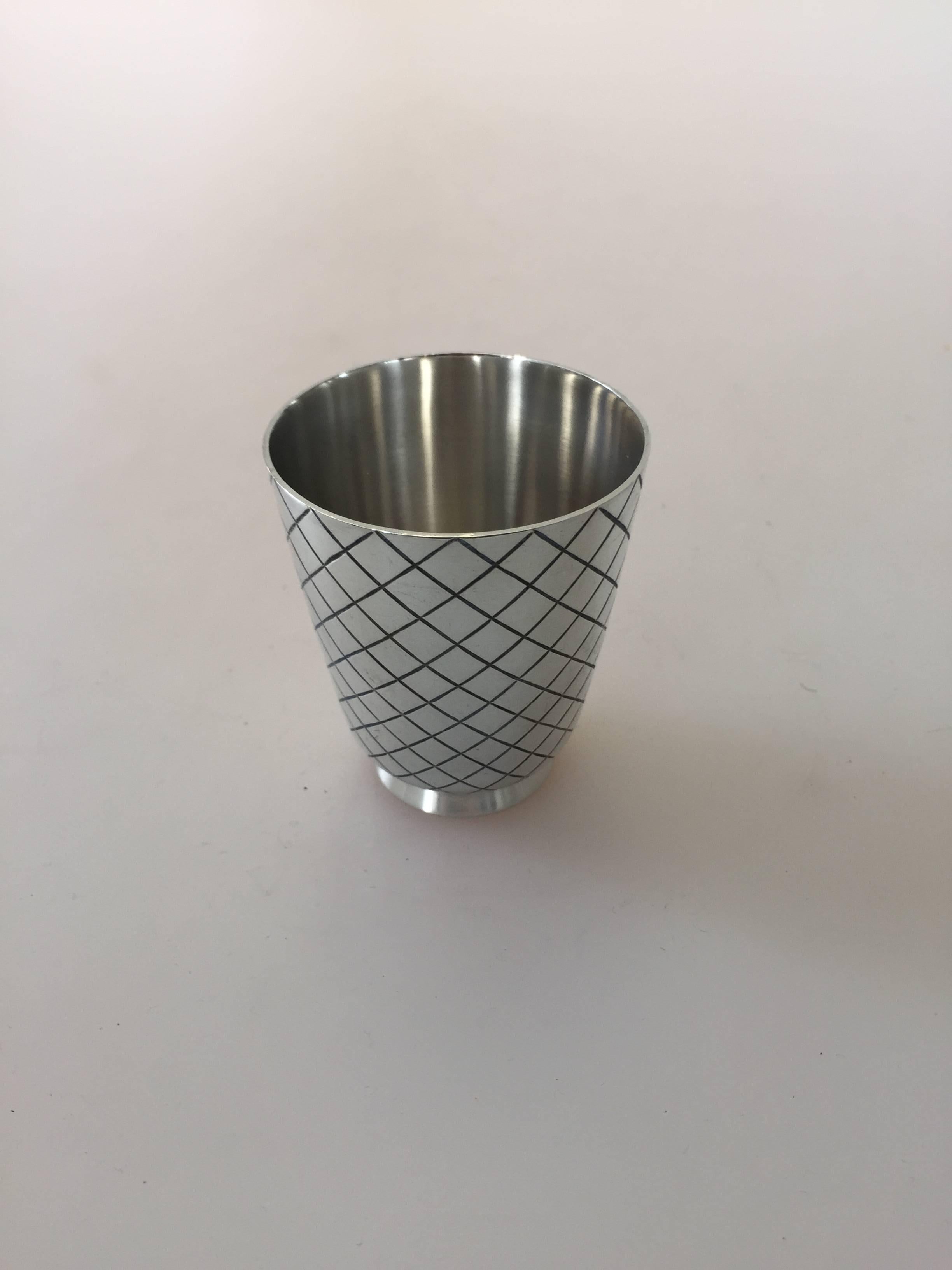 Georg Jensen sterling silver Sigvard Bernadotte cocktail cup #819. This elegant cup measures 5.8 cm and is in a good condition. We have several in stock.

As a designer Prince Sigvard Bernadotte (1907-2002) had a long and fruitful cooperation with