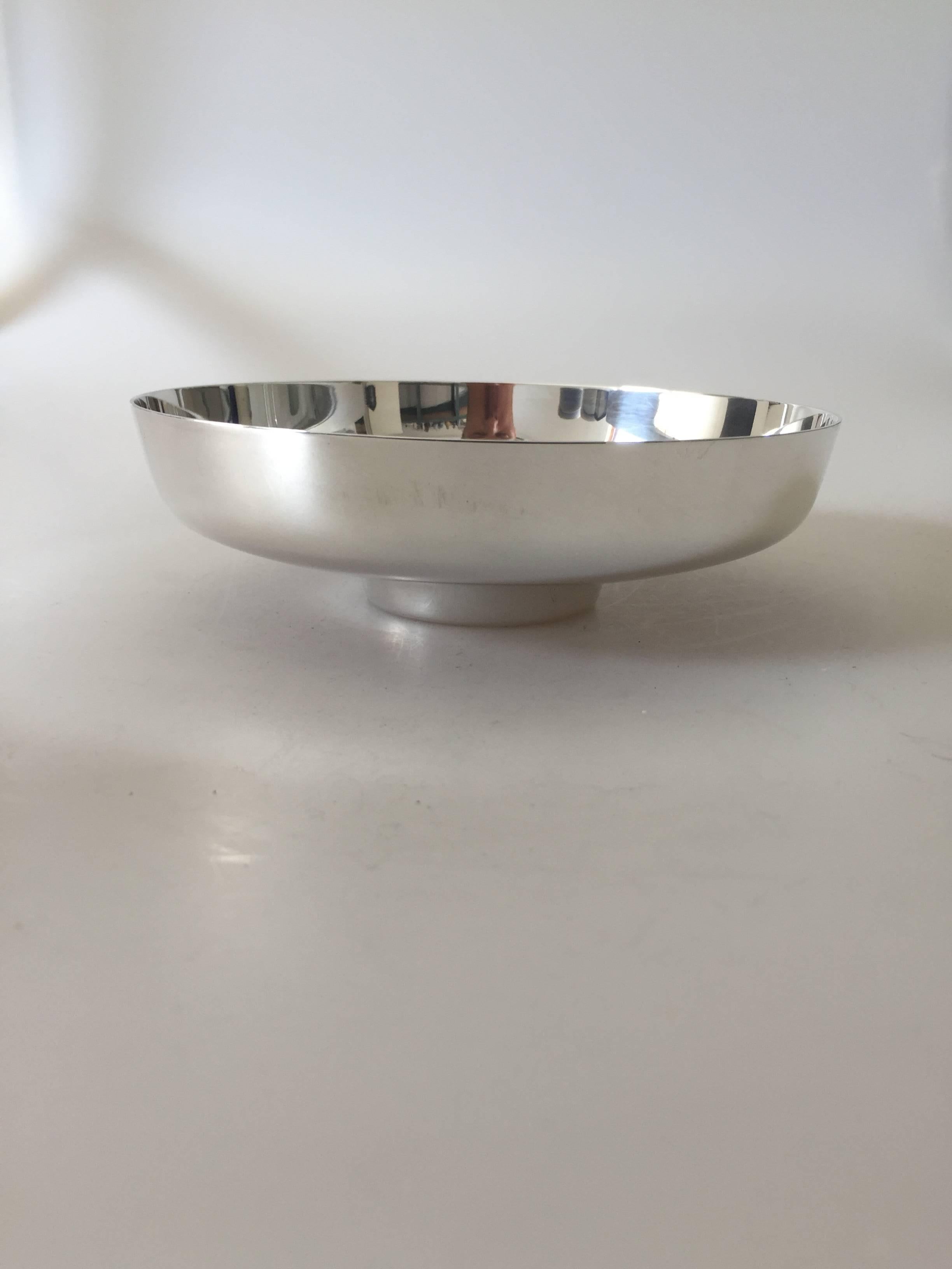 Georg Jensen sterling silver bowl #1132B designed by Henning Koppel. Measures 16.6 cm and is in a good condition. We have two in stock.

Henning Koppels (1918-1981) modern designs broke new ground for Georg Jensen. His designs were constructed in