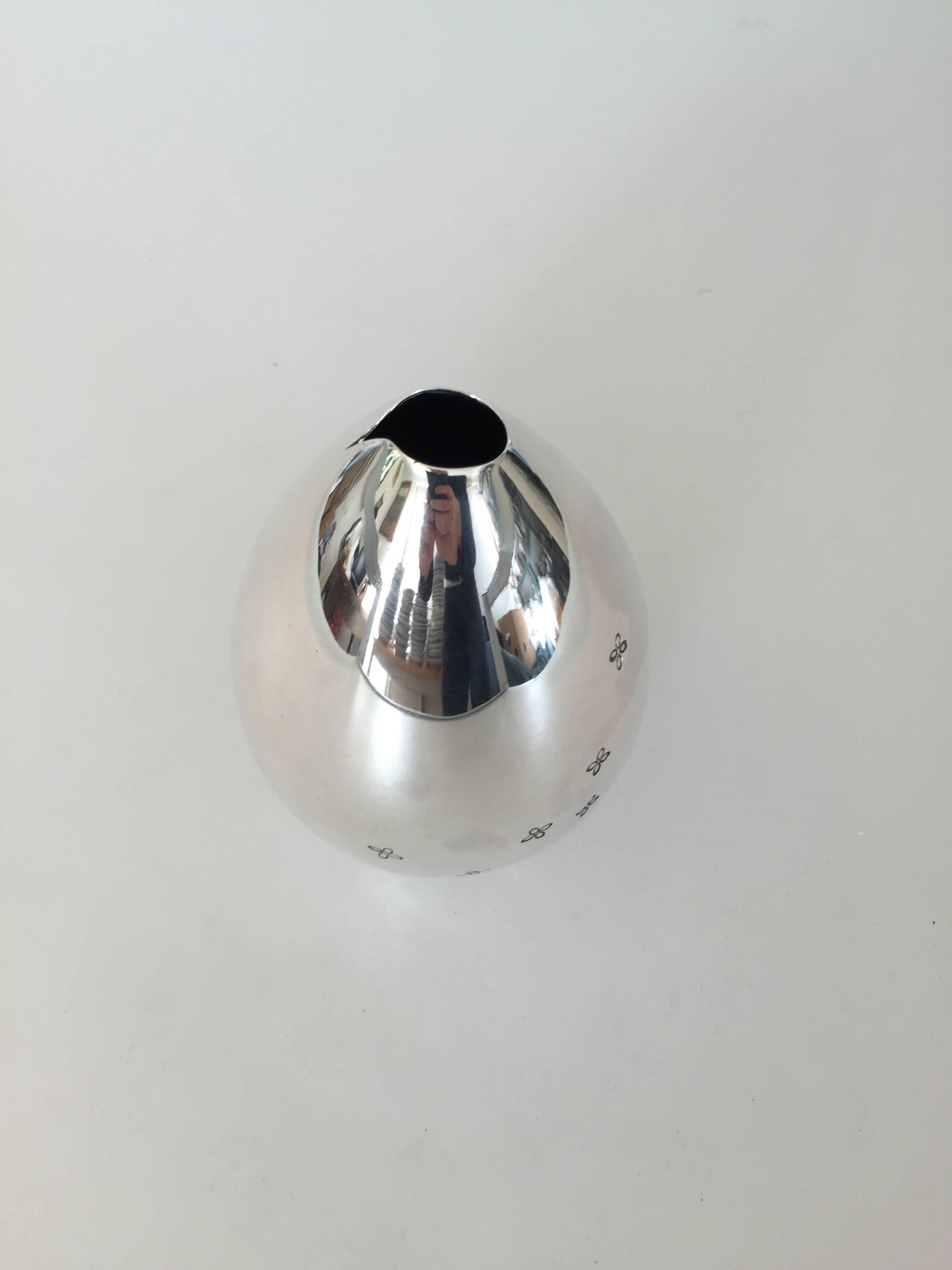 A. Dragsted vase in sterling silver. The measures 13 cm and is in a good condition.

Dragsted is a Danish jeweler and silversmithy known for its excellent craftmanship. The company was founded in 1854 and now specializes in both vintage and highly