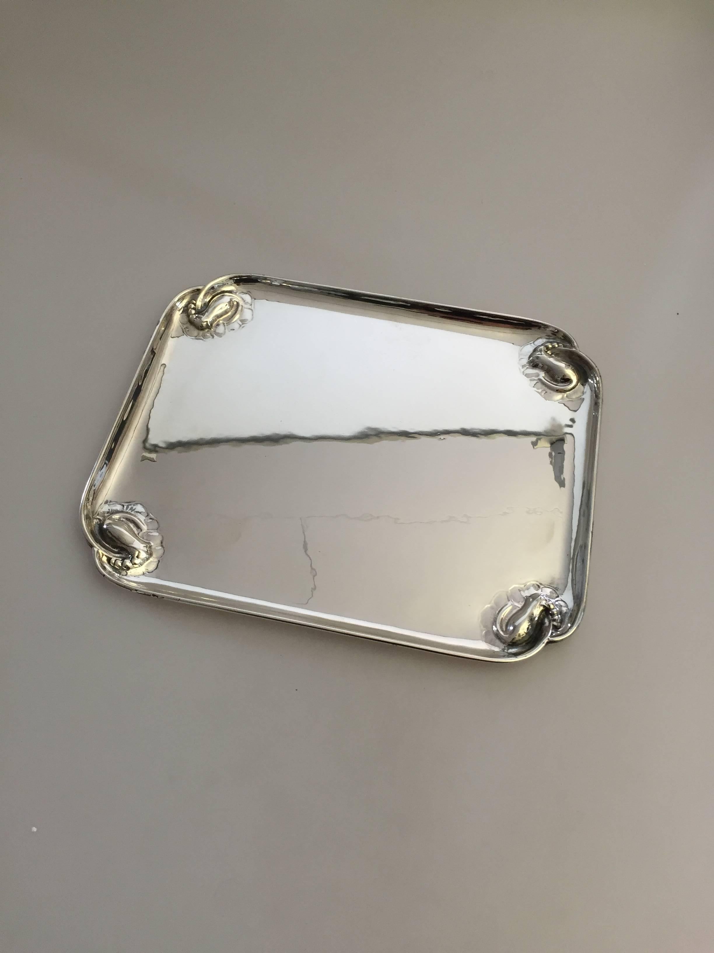 Georg Jensen sterling silver blossom tray. The tray is from 1925-1932. It measures 28 cm x 23 cm. Is in a Fine condition. 

Georg Jensen (1866-1935) opened his small silver atelier in Copenhagen, Denmark in 1904. By 1935 the year of his death, he