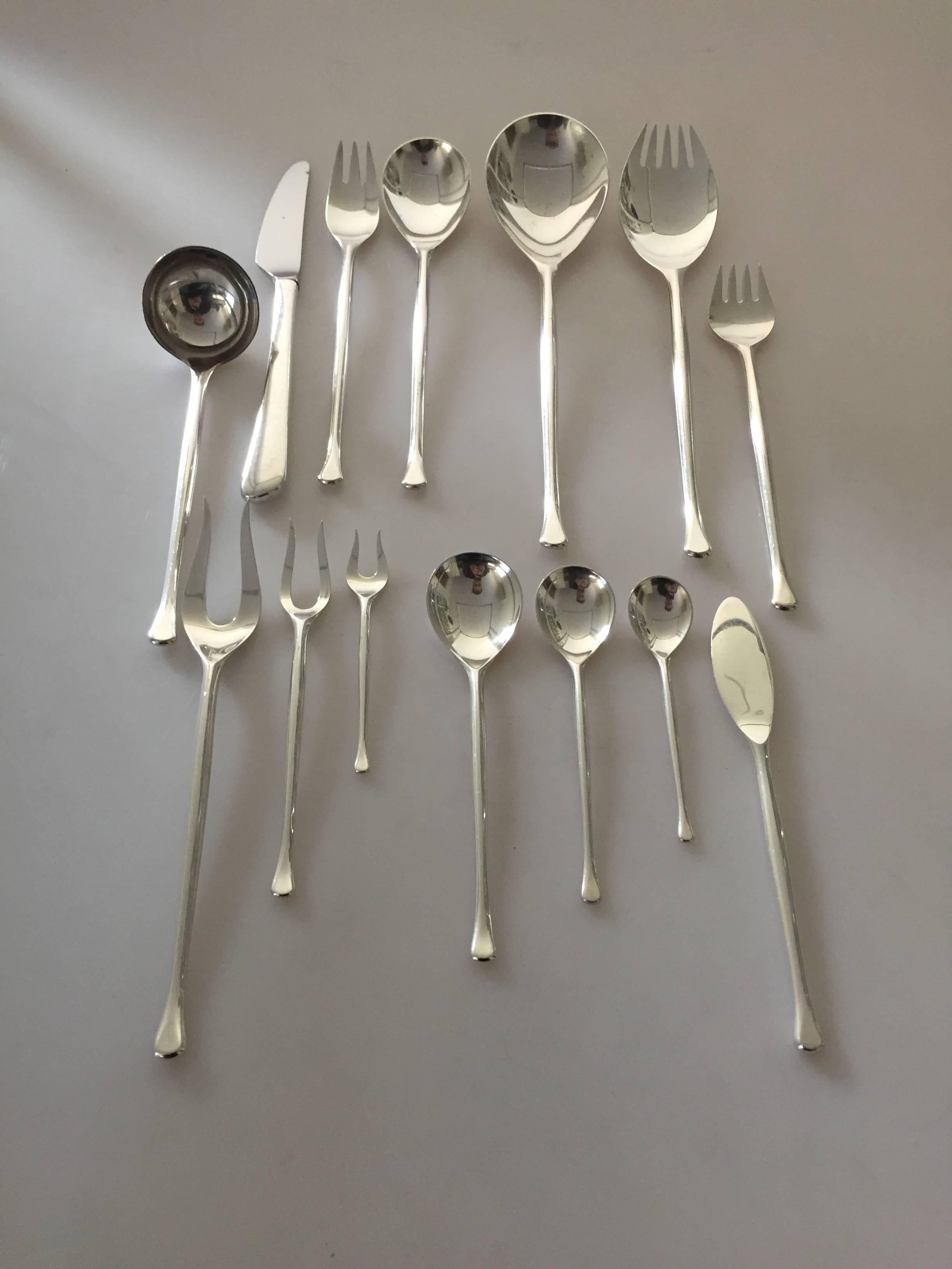 Anton Michelsen sterling silver flatware saphir of 67 pieces designed by Ole Hagen.

 The set:

 12 knifes 21.1 cm.
12 forks 19.6 cm.
12 spoons 15.5 cm.
12 spoons 13.1 cm.
12 spoons 10.6 cm.
One salad fork 23.1 cm.
One salad spoon 23.5