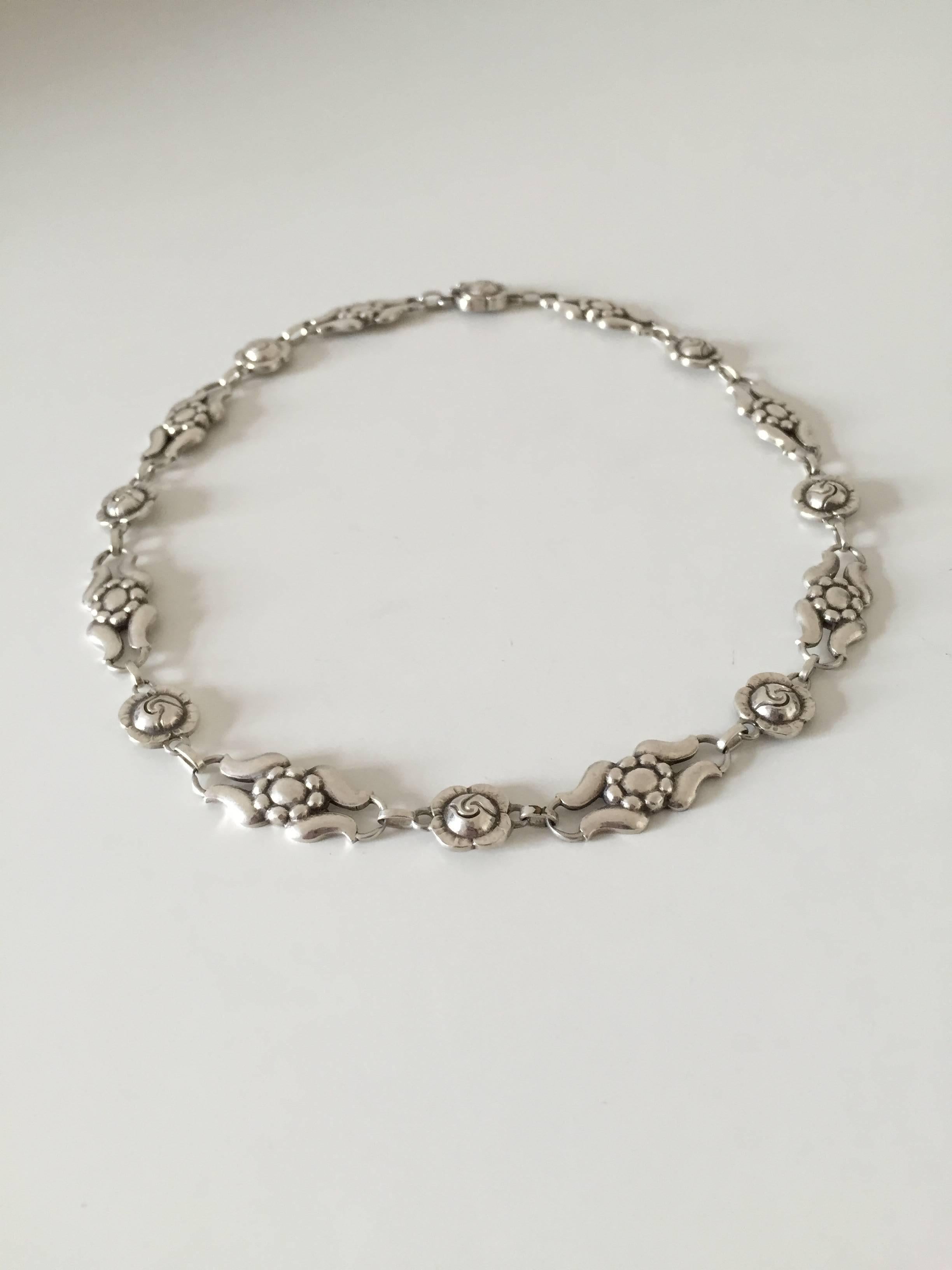 Georg Jensen sterling silver necklace. The necklace has older marks and is in a good condition. It measures 45.4 cm (17 7/8