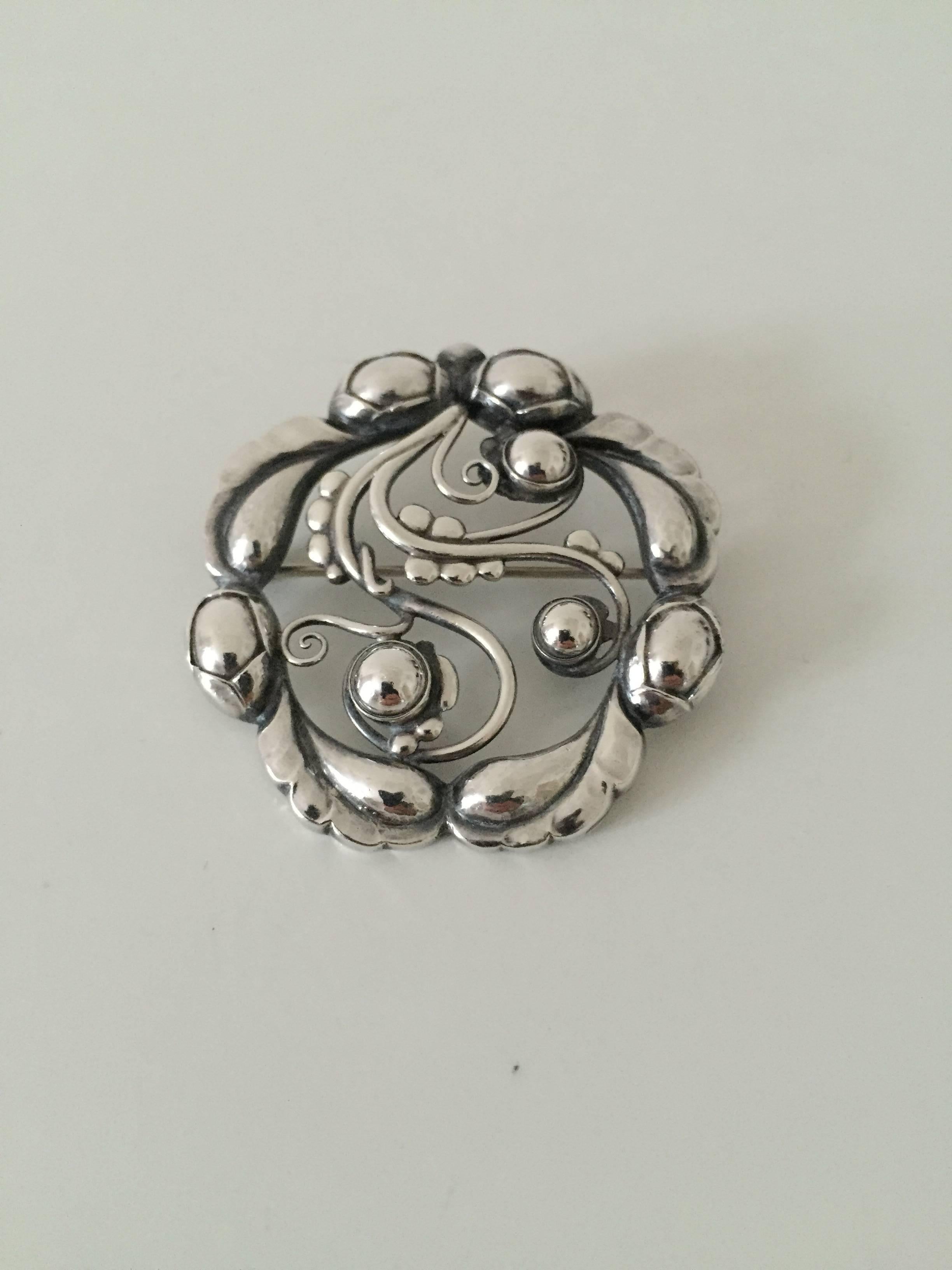Georg Jensen sterling silver brooch #159. Made with old marks. 

Measures 4.8 cm (1 9/10