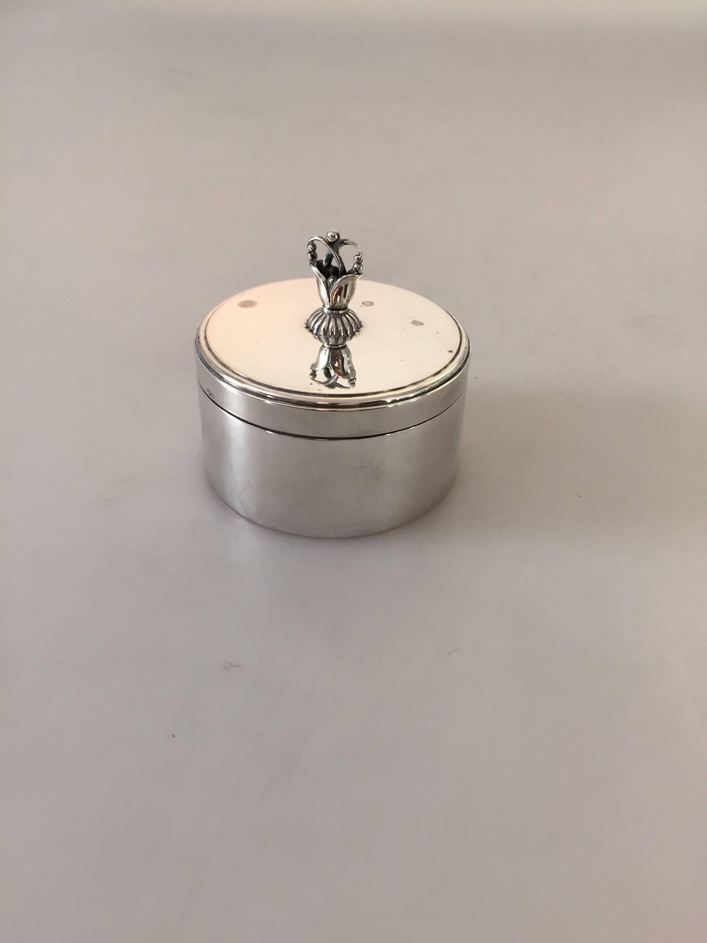Georg Jensen sterling silver box #172K. From 1933-1944. Designed by Harald Nielsen. 

Measures: 4 cm high (1 37/64