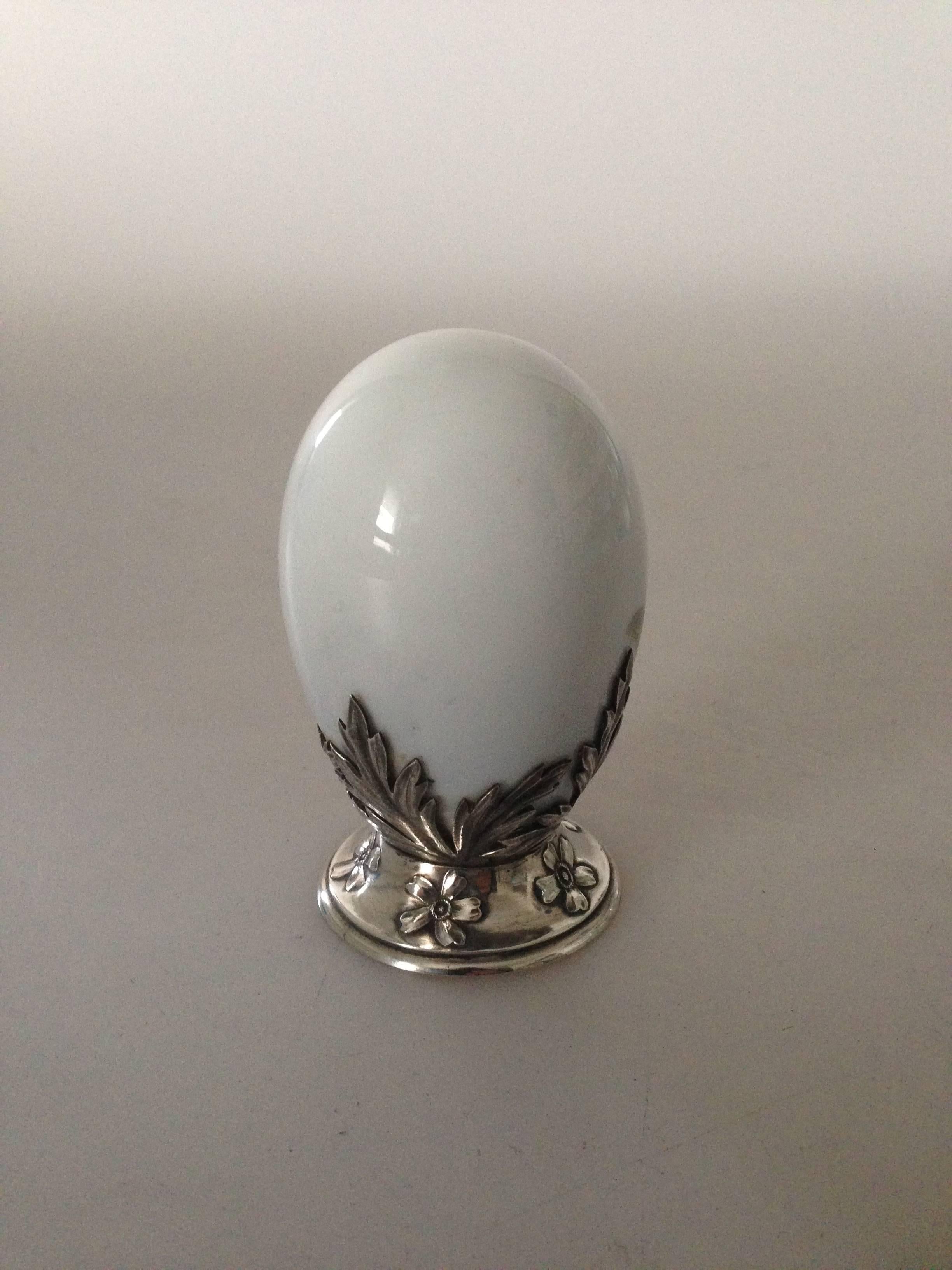 Royal Copenhagen Art Nouveau egg with Anton Michelsen silver mounting from 1902. Also see the other egg we have. 
This is pure luxury.