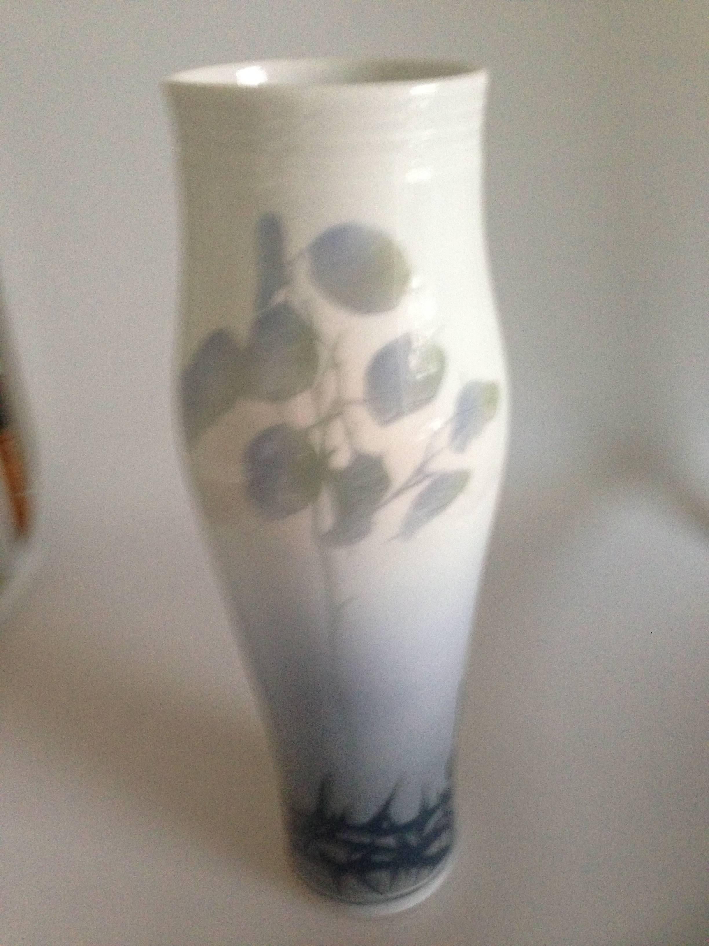 Royal Copenhagen unique Art Nouveau vase by Berta Nathanielsen from 1906 and is with butterflies. Measures 43cm high and 13cm diameter at the top and is in perfect condition.