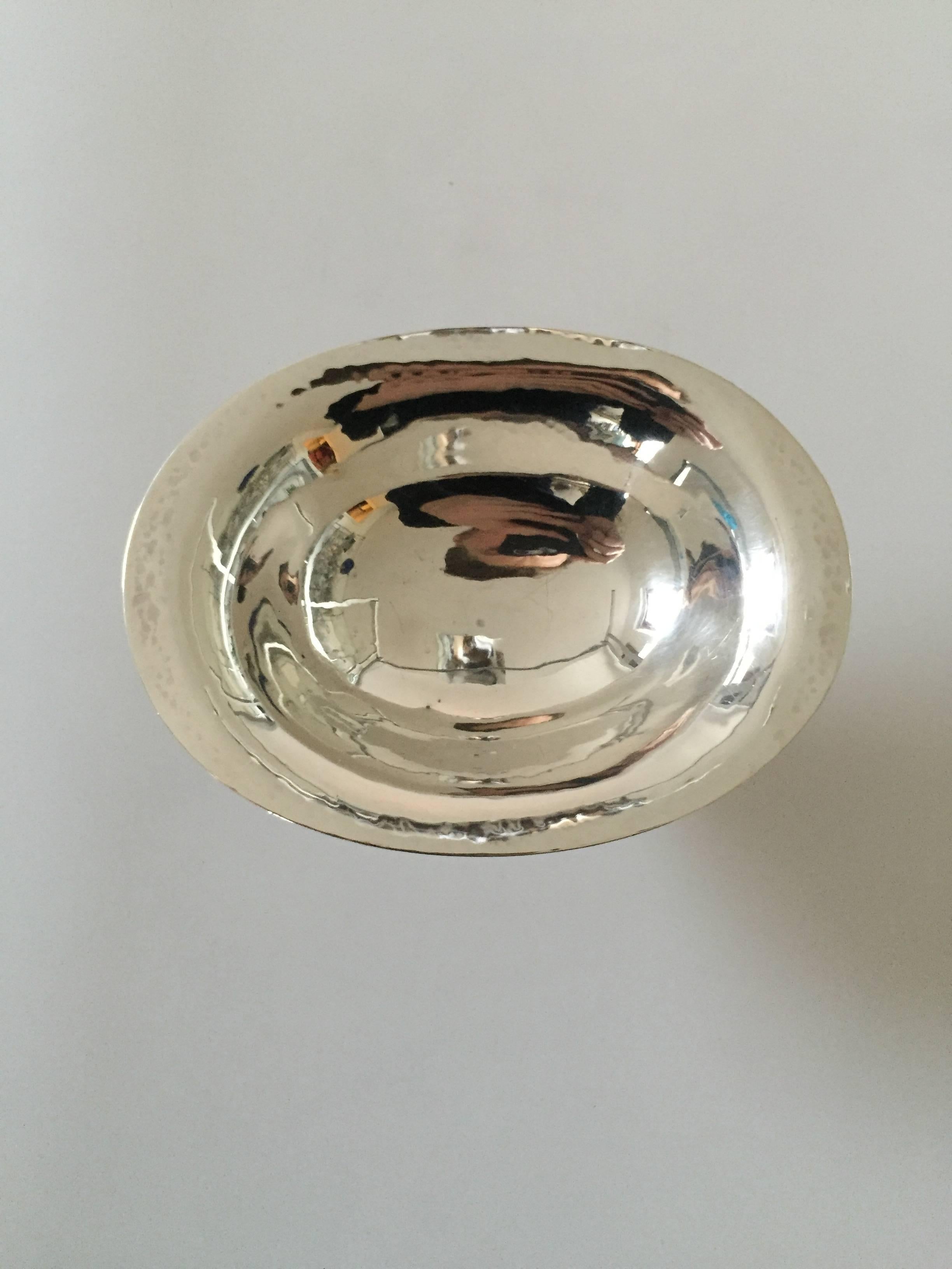 Georg Jensen sterling silver footed bowl #42. 

Measures 13.1 cm x 10 cm x 6 cm.

