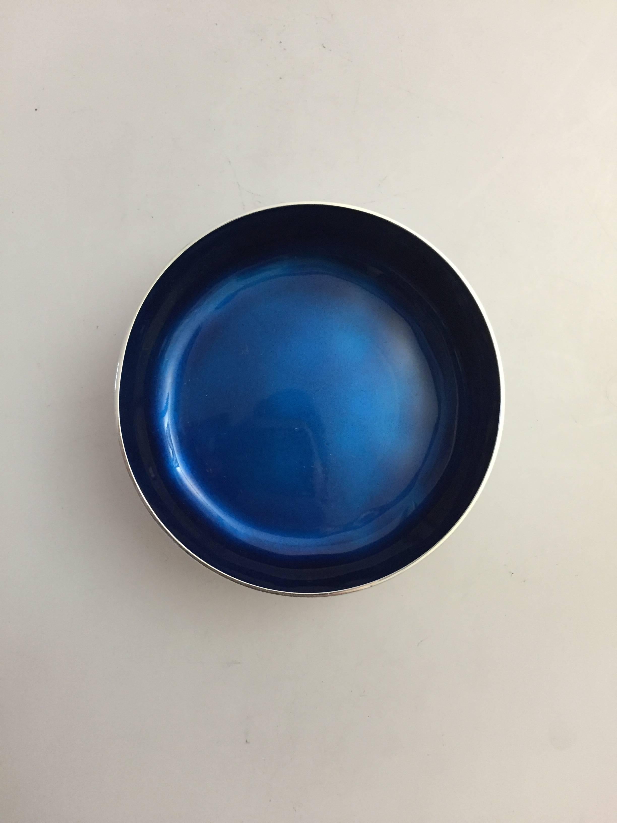 Georg Jensen sterling silver Henning Koppel blue enamel bowl #1158. 

Measures: 8 cm in diameter, 3 cm H.