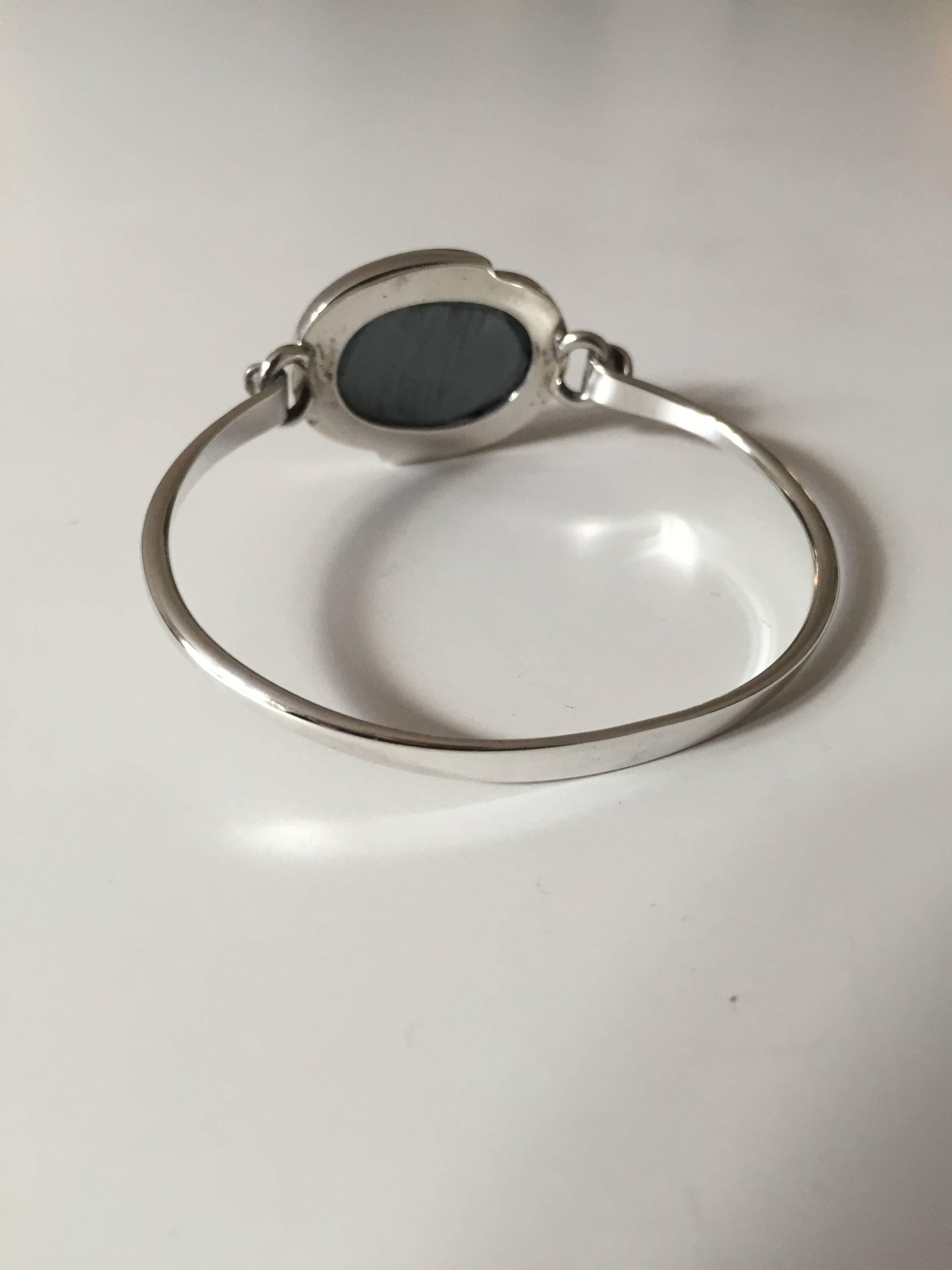 N.E. From sterling silver bracelet with Hematite stone. 

Weighs 19.1 g / 0.67 oz.

Niels Erik From (1908-1982) - Danish jeweler.
