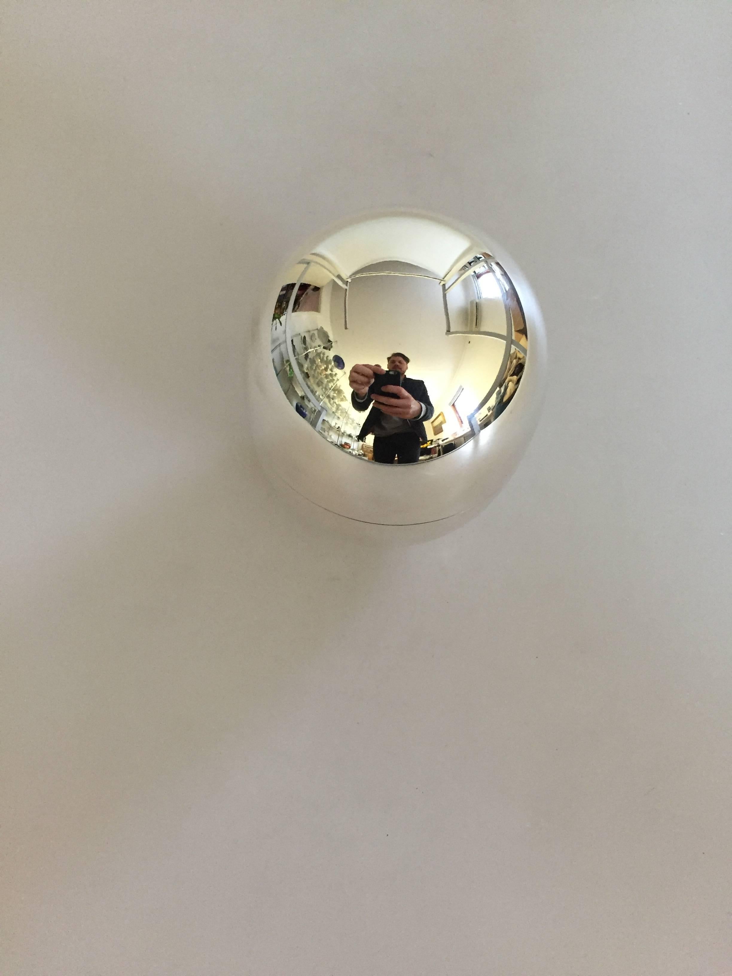 Georg Jensen sterling silver Piet Hein egg/box #1147A. 

 Weighs 241 g / 8.55 oz.
 Measures: 10 cm H, 8 cm diameter.