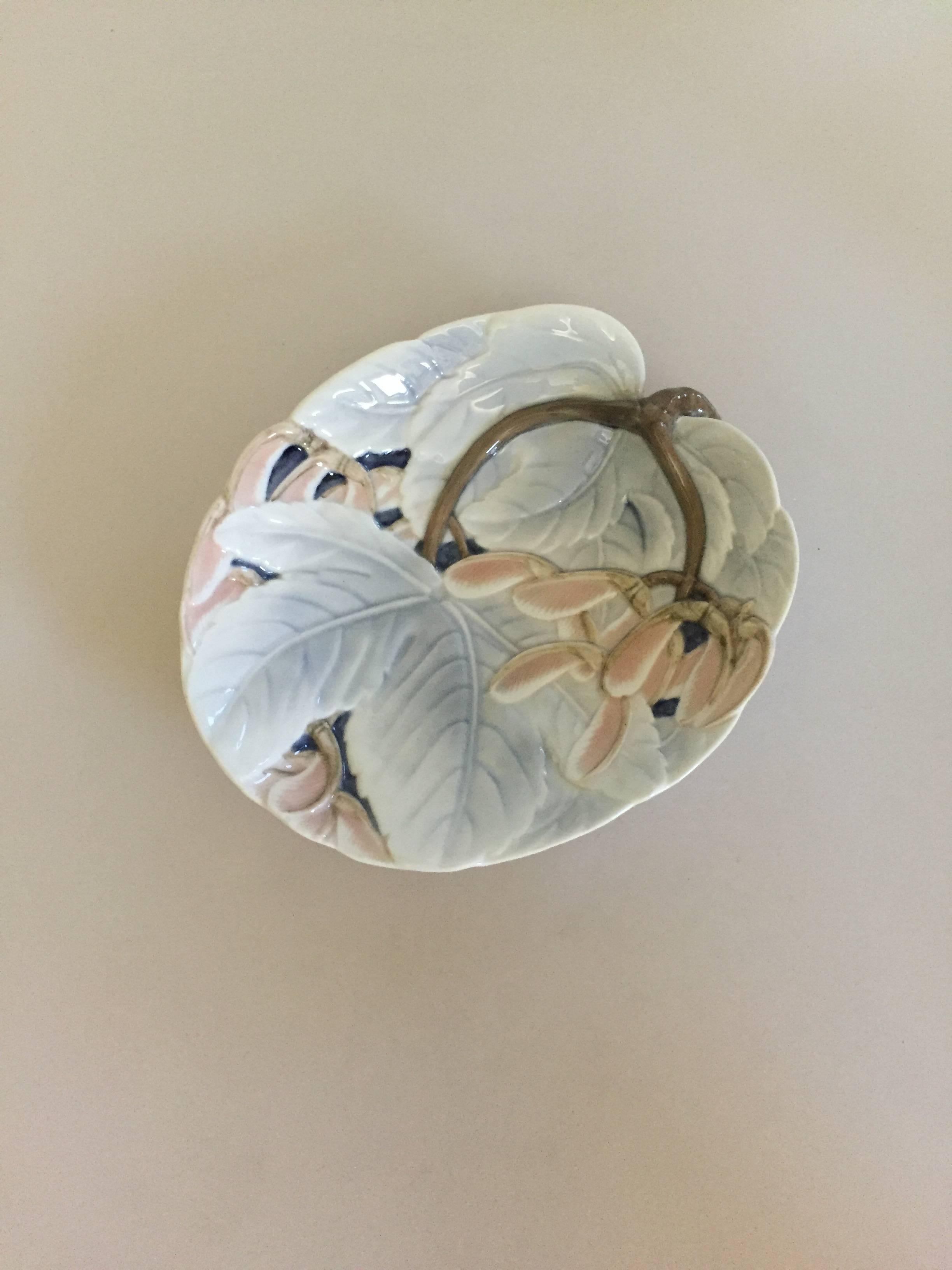 Bing & Grondahl leaf-shaped bowl or ashtray #1113. Designed by Effie Hegermann-Lindencrone.

Measures: 16.5 x 18.5 cm.