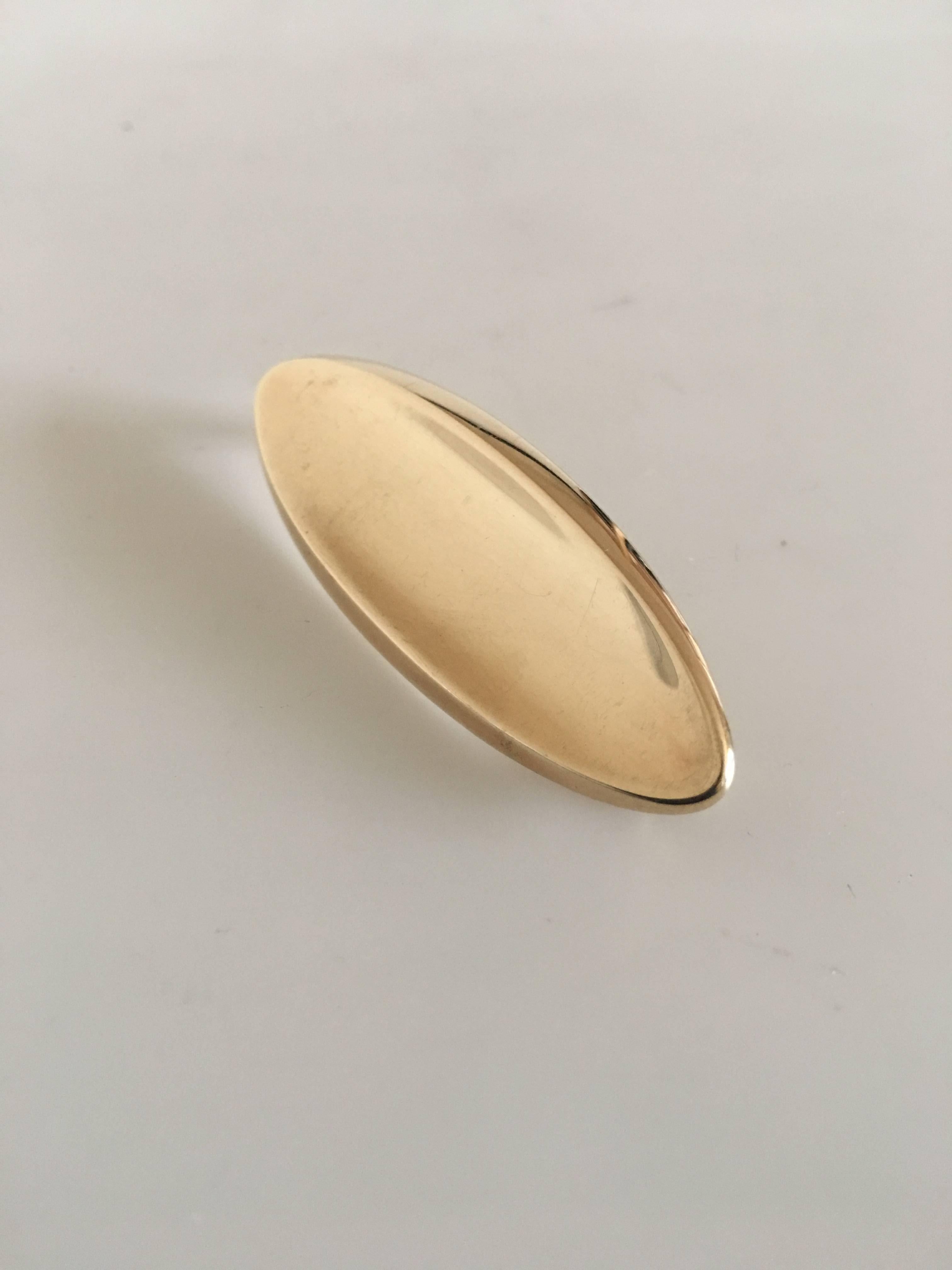 Hans Hansen 14-karat gold brooch #102. Measures: 5.6 cm L (2 13/64