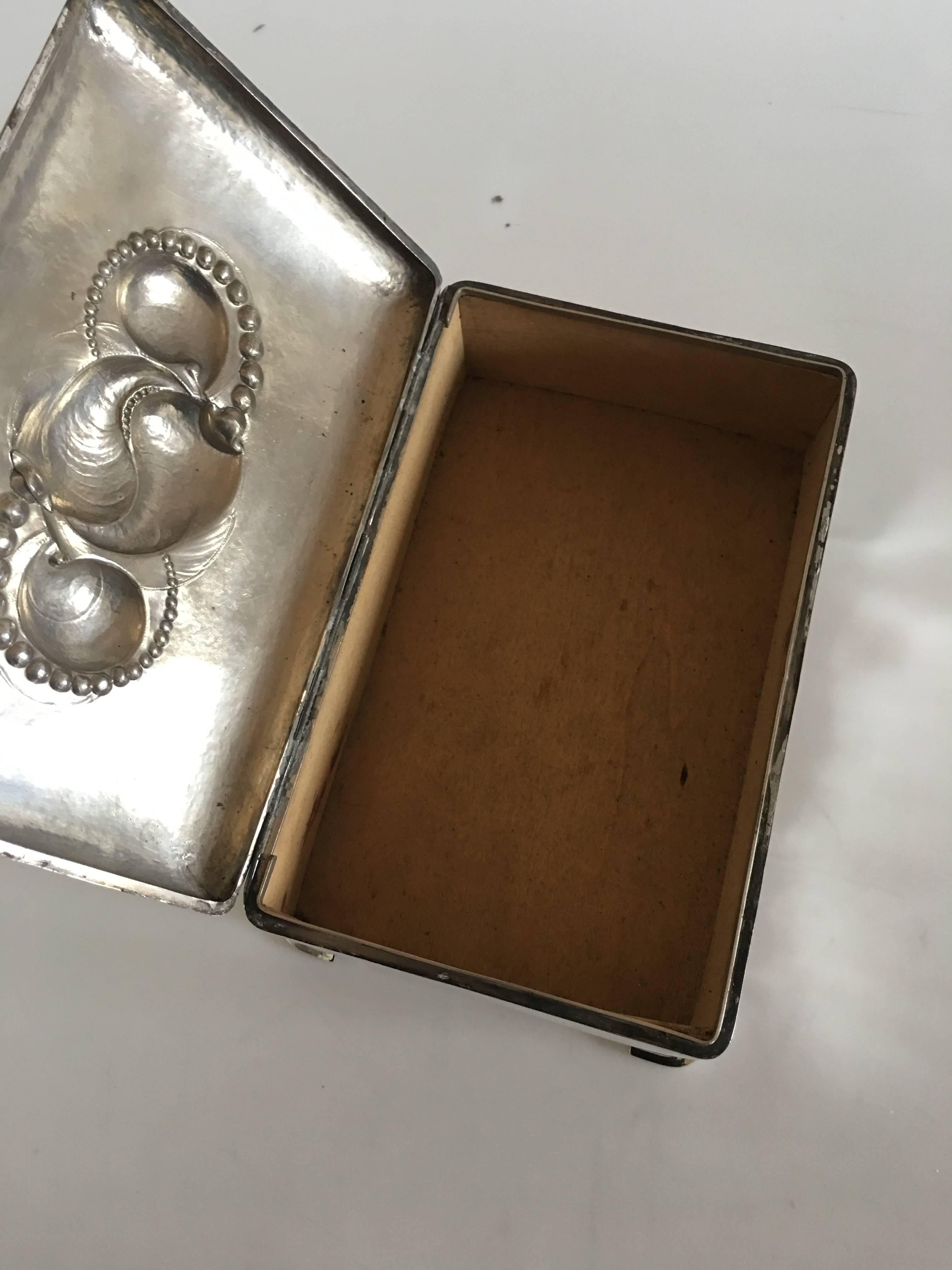 Large Evald Nielsen silver box. Silver ornament with shell forms and whole silver pearls. Measures 15 x 24.5 cm (5 29/32