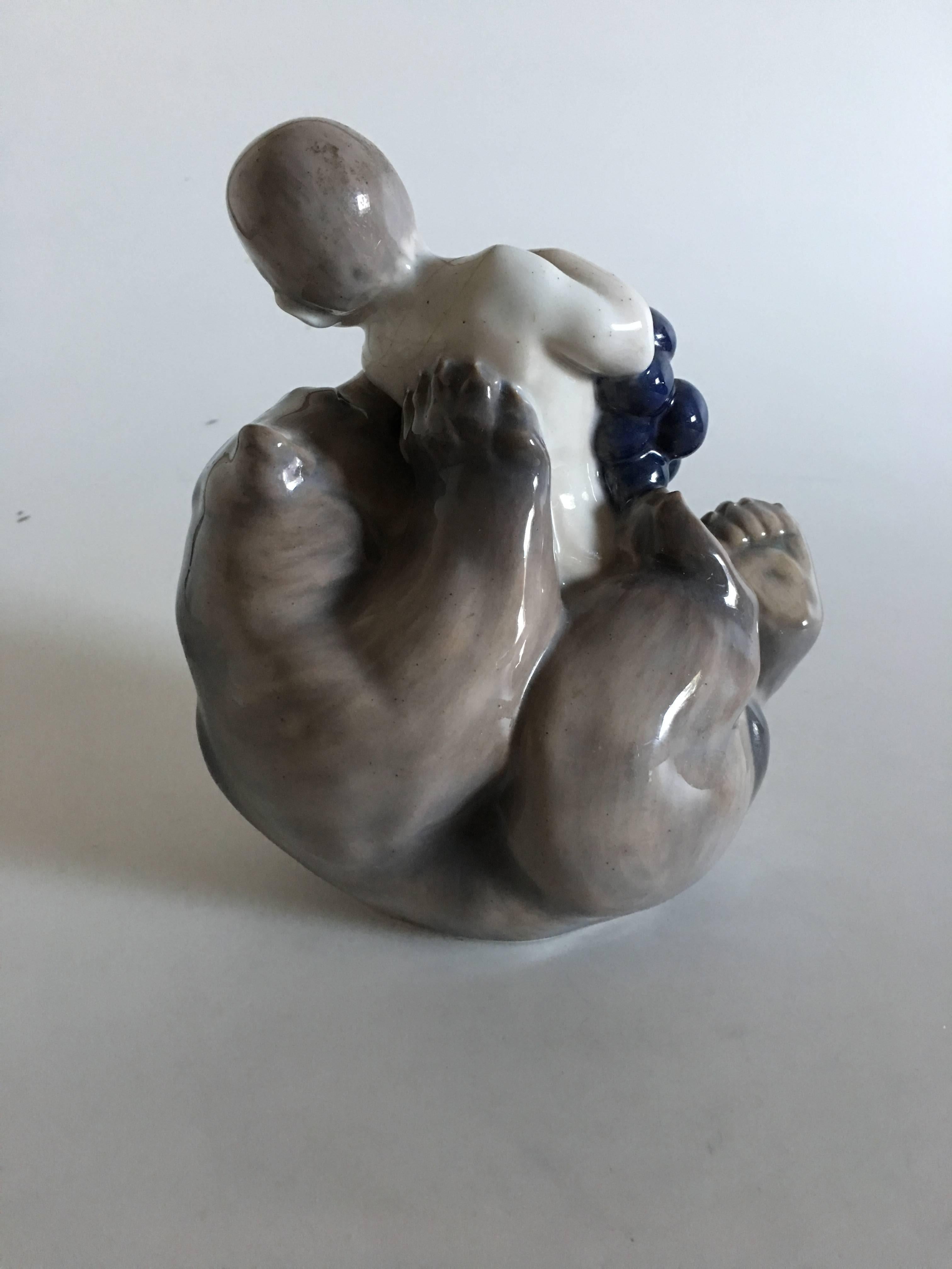 Danish Royal Copenhagen Figurine of Faun with Grapes Sitting on a Bear #2318