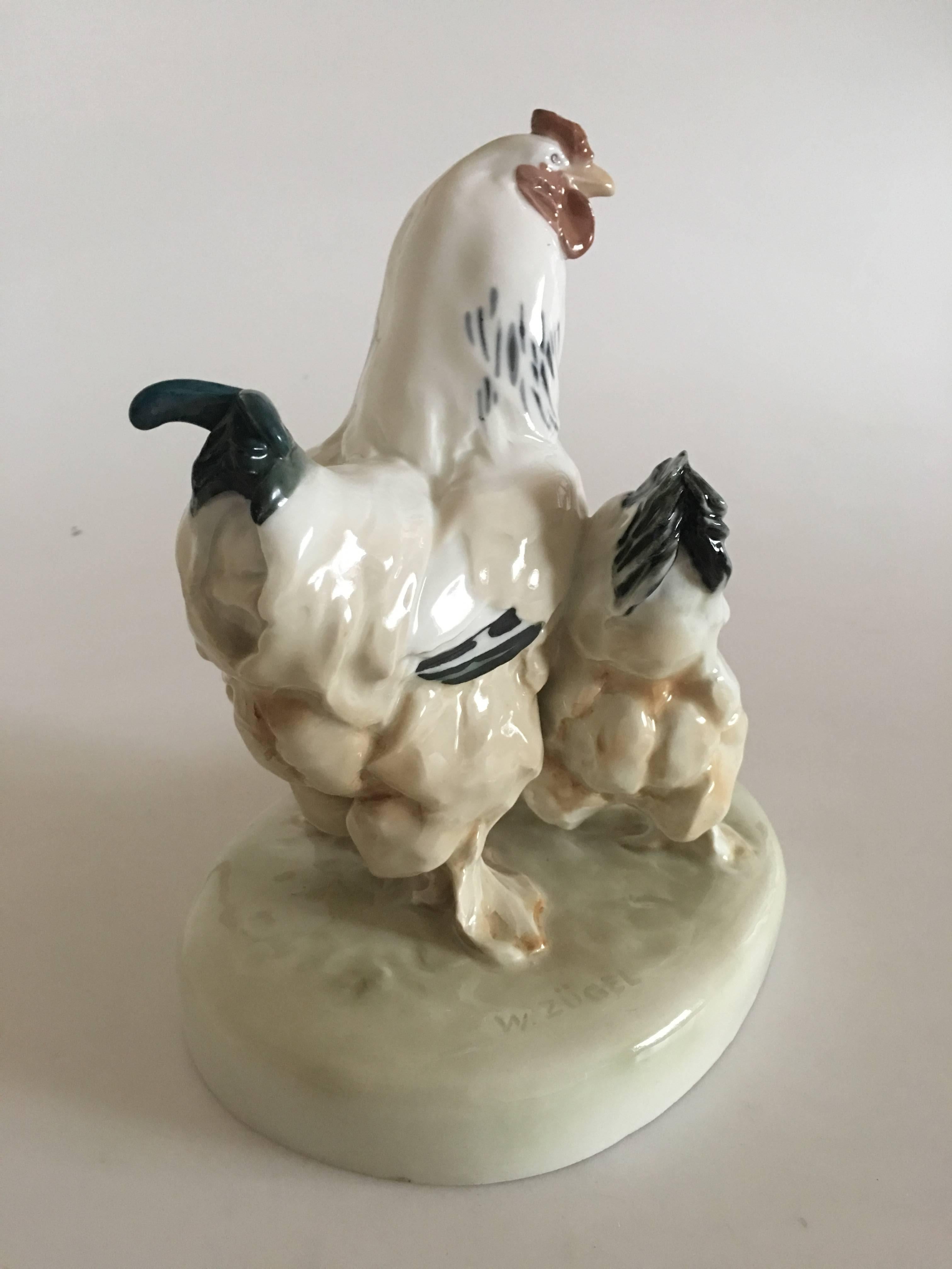 Meissen figurine of two chickens. Measures: 22 cm H (8 21/32