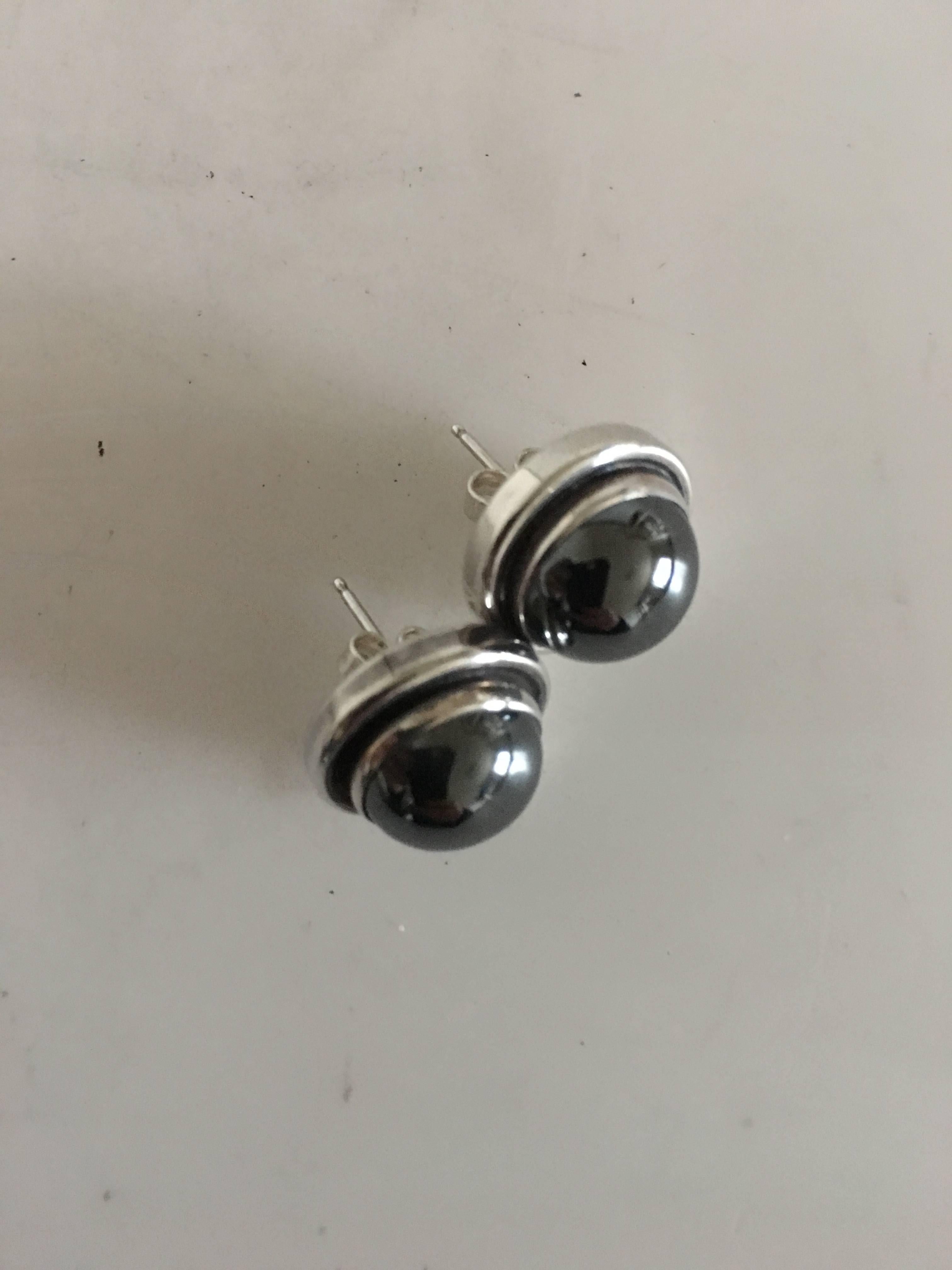 Georg Jensen sterling silver earrings #86D with hematite stone. Measures 1.2 cm diameter (0 15/32"). Combined weight is 12 grams (0.40 oz). From after 1945.