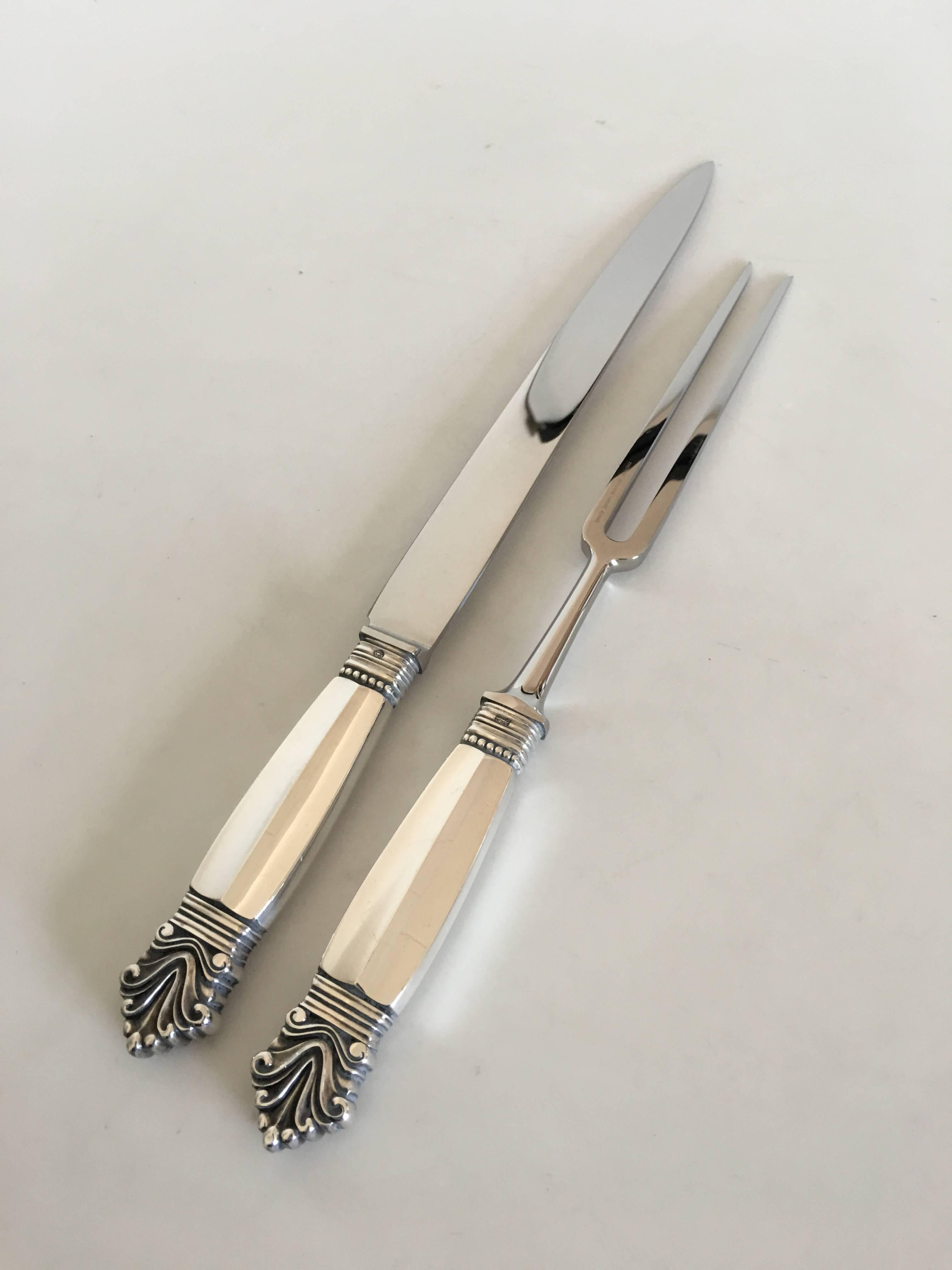 Georg Jensen acanthus carving set in sterling silver and stainless steel. 31 and 34.5 cm L (12 13/64