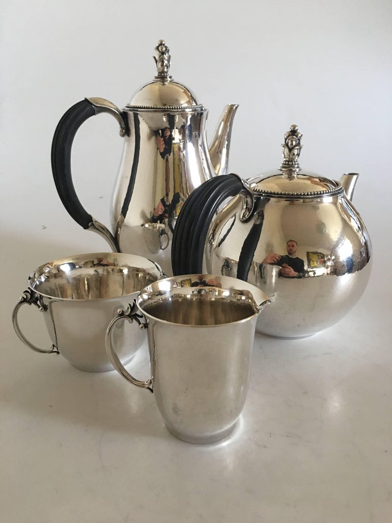 Georg Jensen sterling silver coffee and tea set no. 456. Designed by Harald Nielsen. All pieces manufactured after 1945. 

Coffee pot no. 456 A. 24 cm H (9 29764