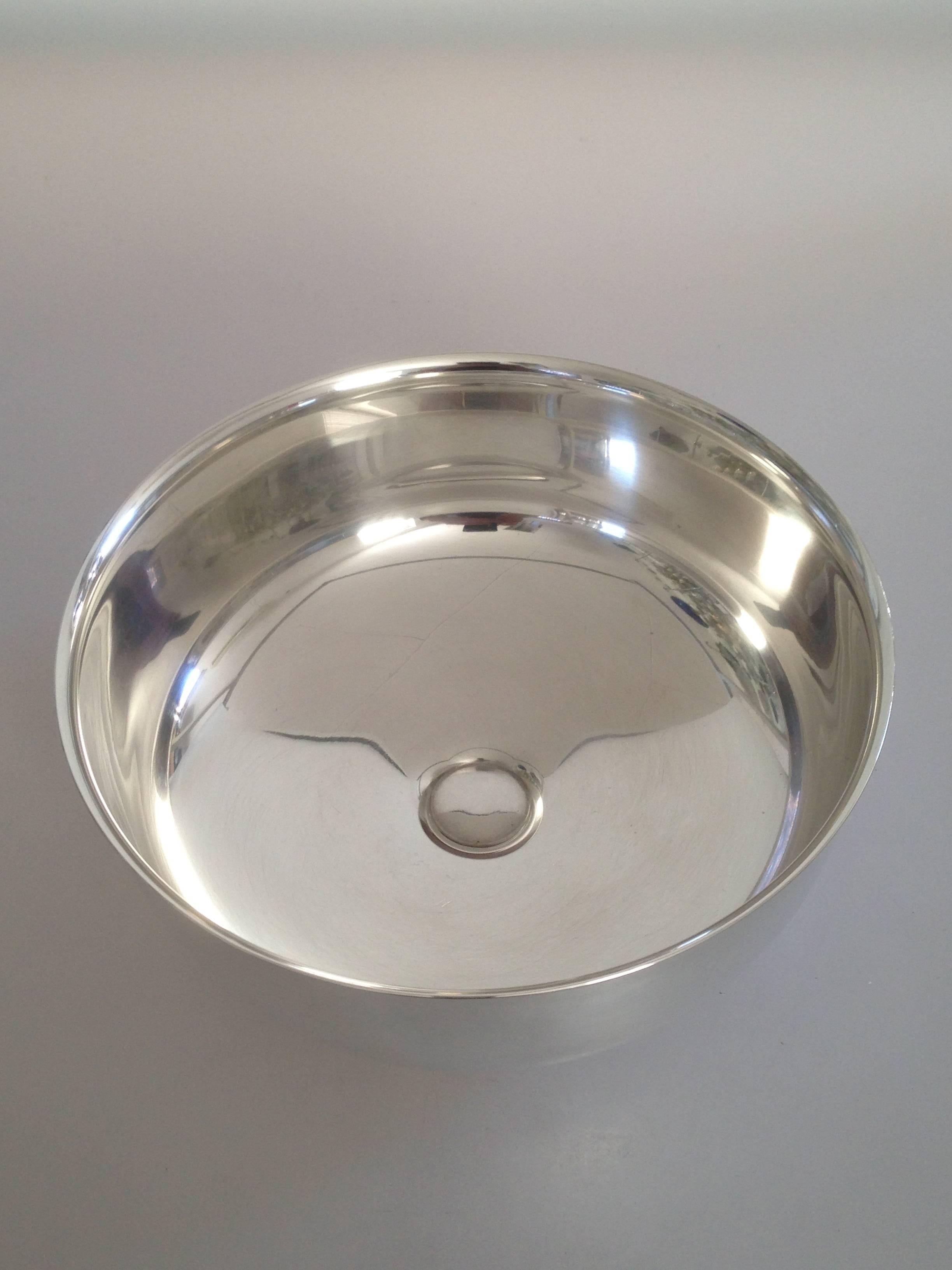 Georg Jensen sterling silver bowl by Alev Siesbye #1291B.

Measures: 20.5cm diameter and 8.5cm high / 8 1/10