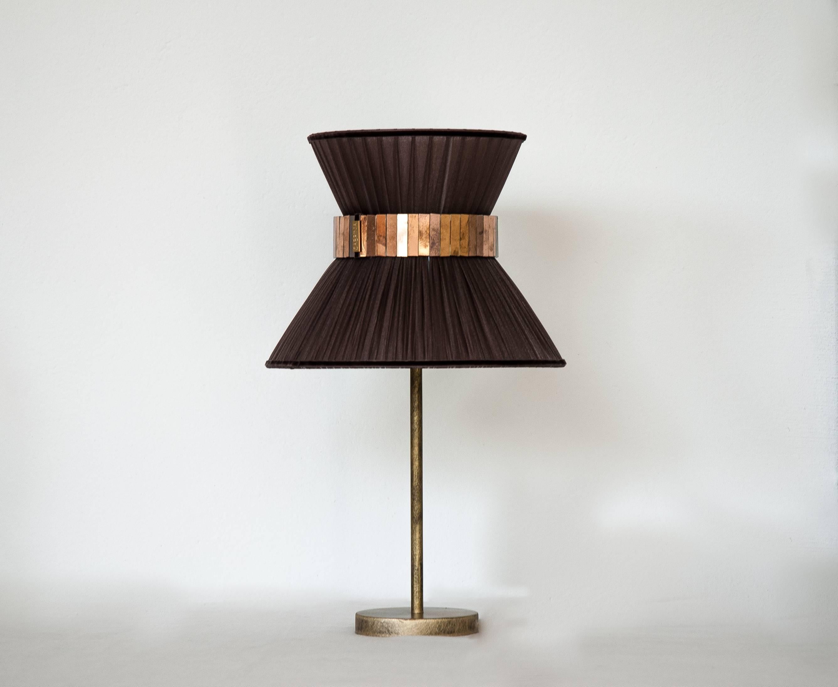 This light object  is a contemporary piece, entirely made in Tuscany and produced 100% by hand in Sabrina Landini's atelier. 
The Tiffany lamp is Sabrina's first creation and is inspired by Audrey Hepburn's timeless charm. Attractive, transversal,