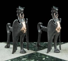 Pair of Antique Cast Iron and Copper Mounted Griffin Andirons