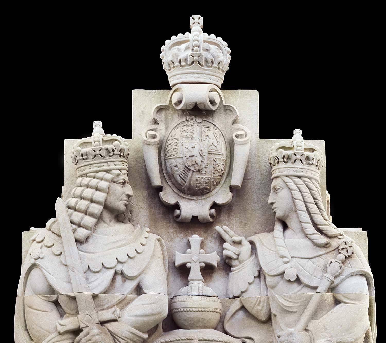 A massive carved Portland stone tableau of the reigning monarchs, William & Mary (1689-1702), granting The Bank of England
Charter in 1694. Sculptor Esmond Burton (1885-1964). 

Part of a collection of approximately 45 statues and carvings