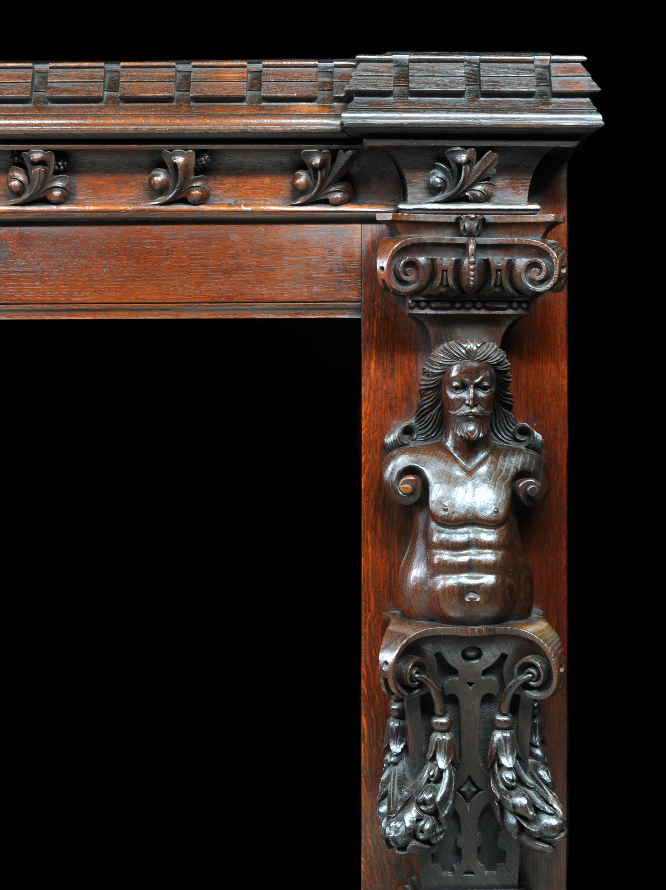 English Castellated Jacobean Revival Style Antique Carved Oak Fireplace Mantel For Sale