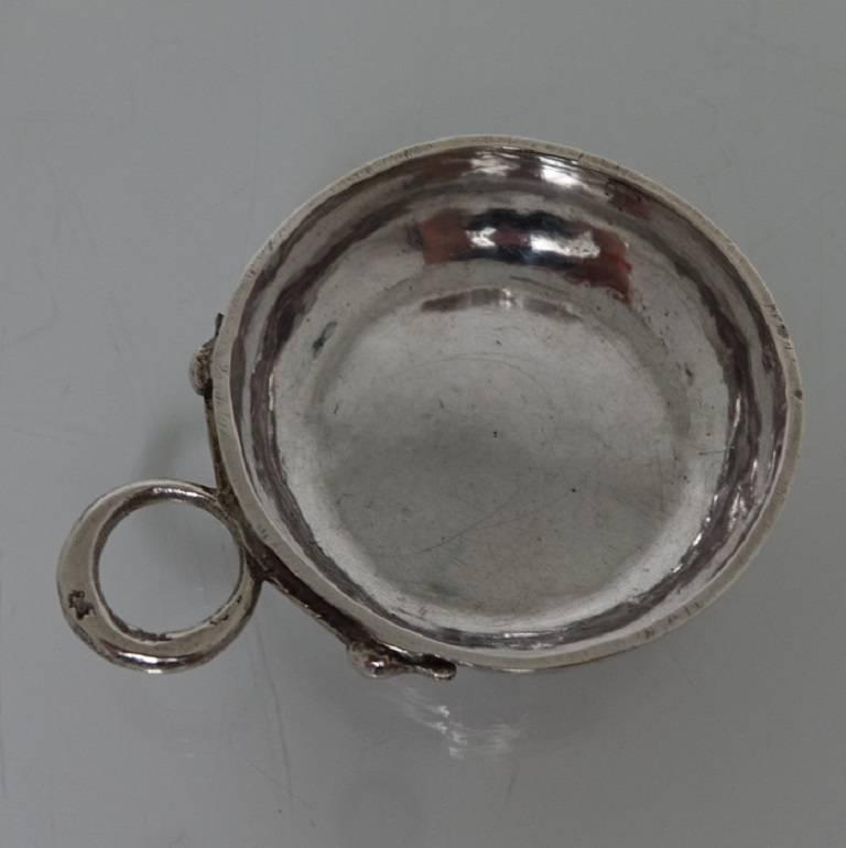 A very sweet and extremely collectable French Provincial silver wine taster, plain formed in design with beautiful Hammer marks around the bowl giving it a wonderful patina. The wine taster has contemporary attached reinforced ring for hanging from