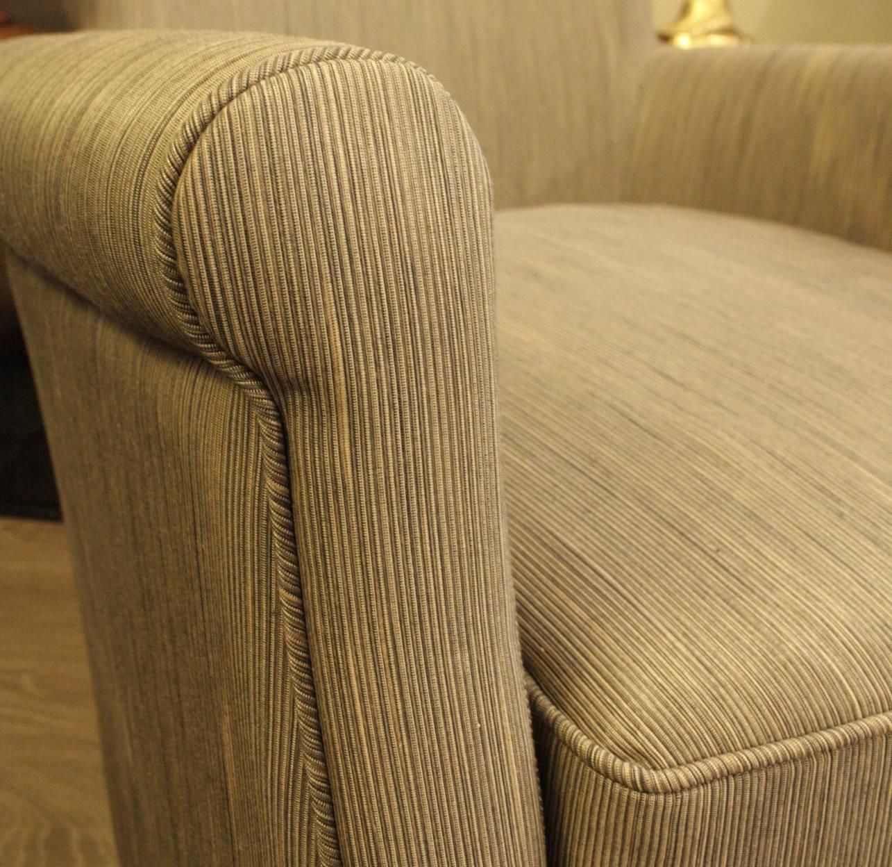 Art Deco club chair.
Upholstered in Jim Thompson Thai silk fabric.
Colour: Grey.
 