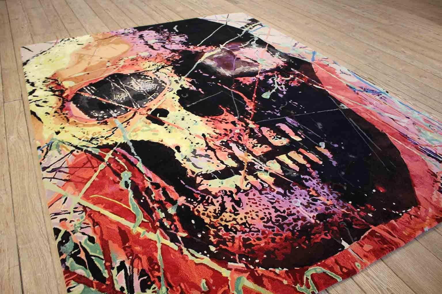 This is a vibrant paint splattered skull rug based off original painting by Artist, Eddy Bogaert. Measures 8' X 10'8".