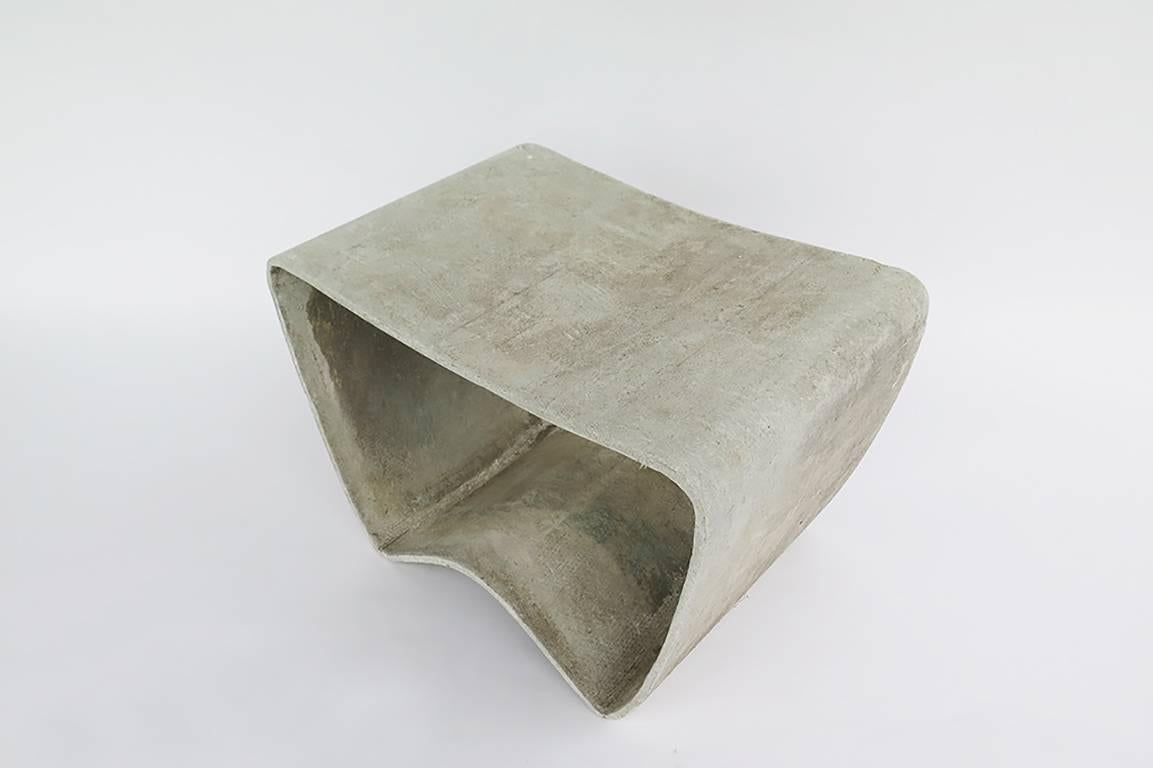 Made of fibrated concrete, this iconic Mid-Century Modern stool was designed by Ludwig Walser in 1954 under the direction of Willy Guhl and manufactured by Eternit. Priced individually, pair available.