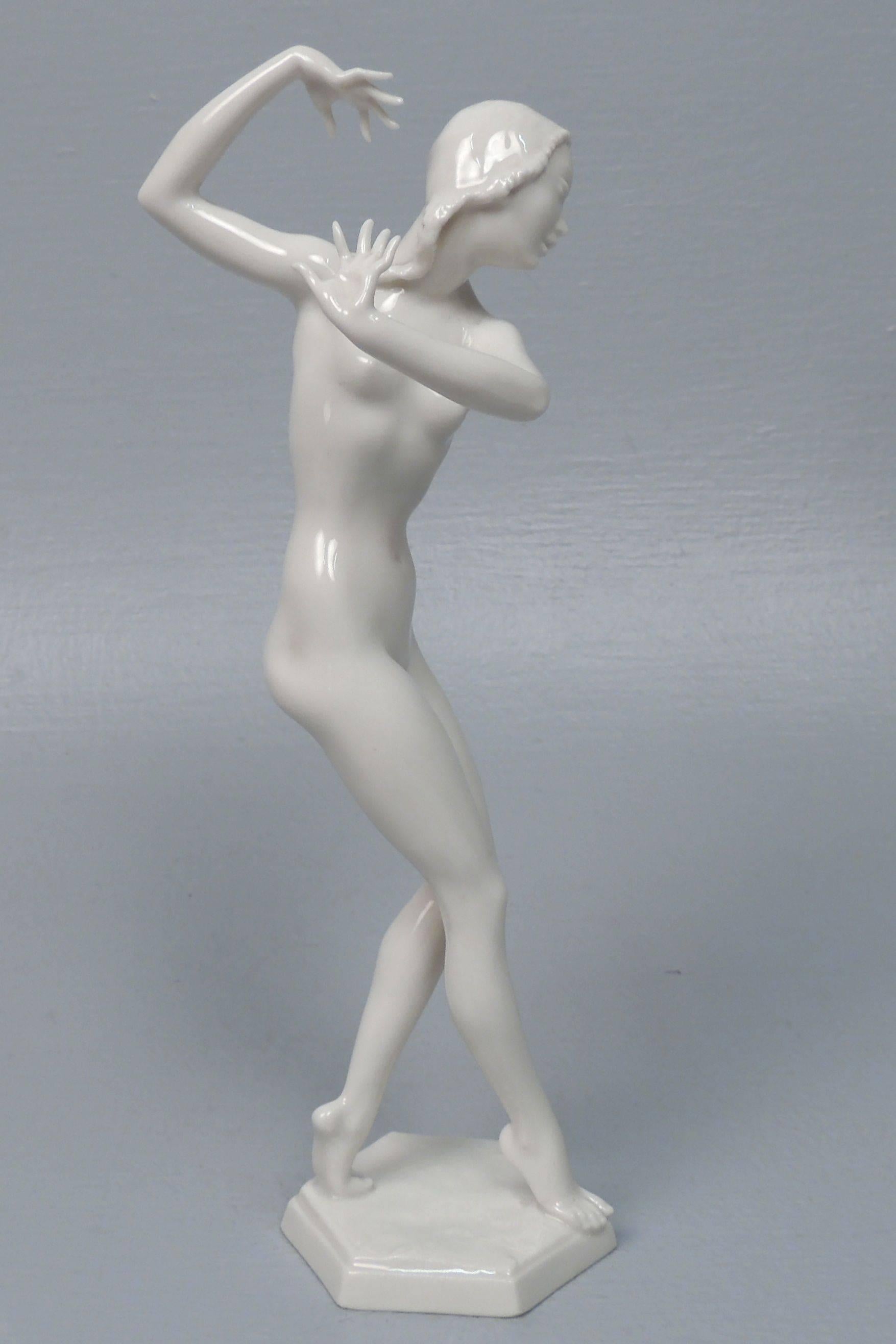 A stylized Art Deco female nude figure by Carl Werner for Hutschenreuther porcelain. 

Dynamically modeled with arms and fingers outstretched. 

Height: circa 8 3/4 in.

Items purchased from David Sterner Antiques must delight you. Purchases