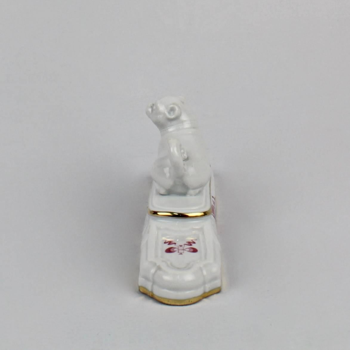 Cast Meissen Porcelain Figural Pug Paperweight in the Pink Court Dragon Pattern