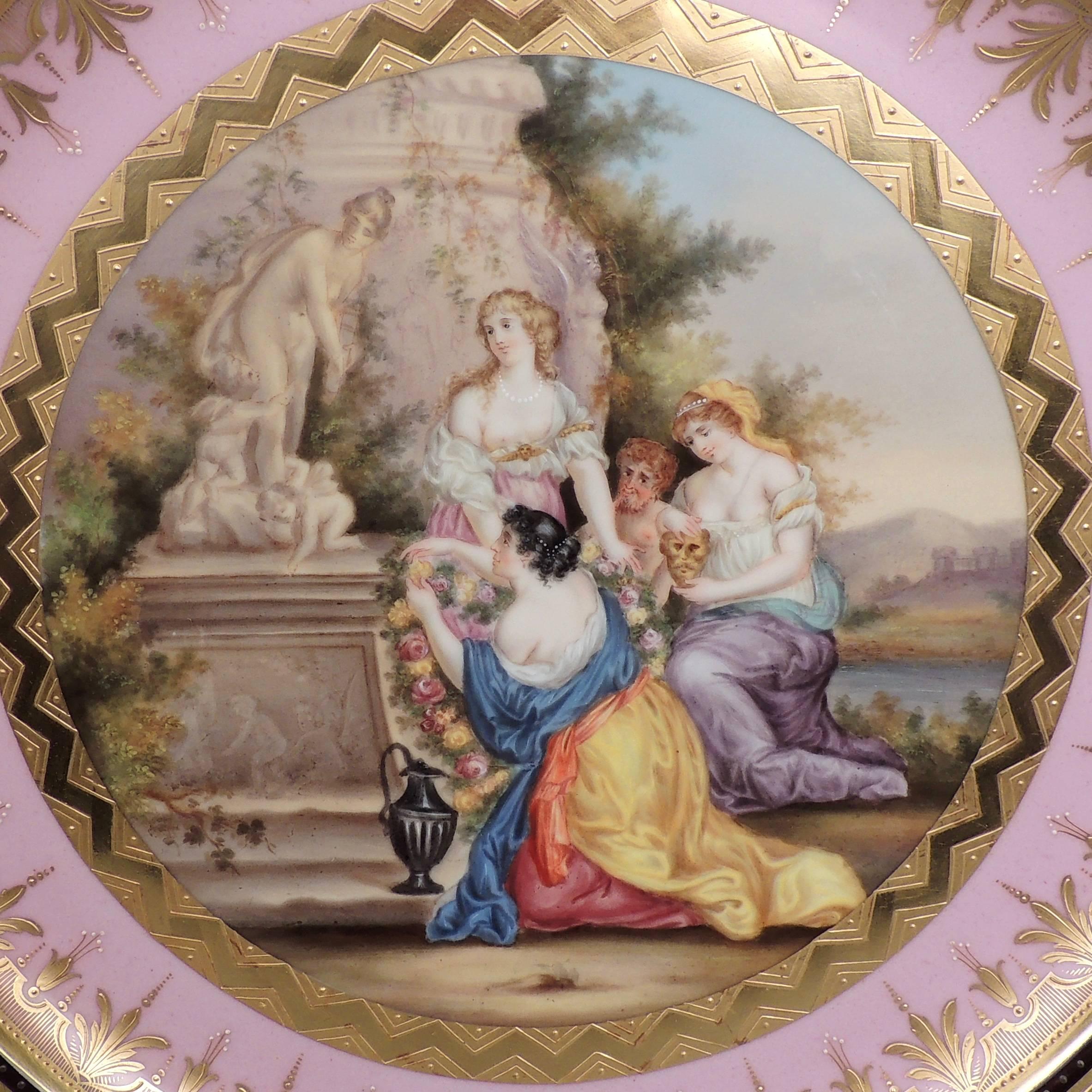 A good octagonal, pink ground, 19th century jeweled and hand-painted Royal Vienna porcelain charger. 

The reverse bears a blue beehive mark and the title 