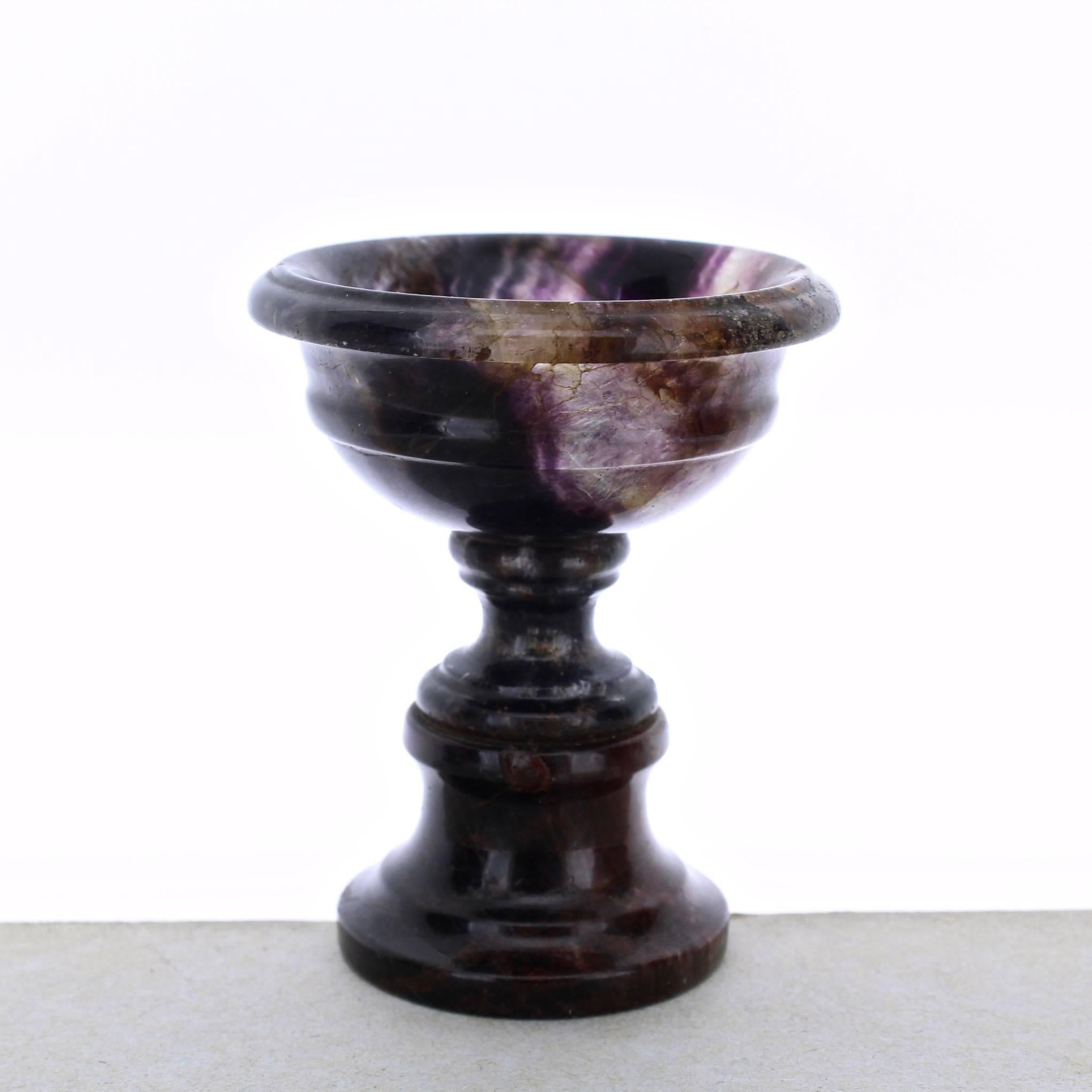 A fine small footed blue john bowl. Possibly a salt cellar on pedestal. 

Likely Regency Period.

Very good color and patterning. 

Height: ca. 3 1/4 in.

Items purchased from David Sterner antiques must delight you. Purchases may be